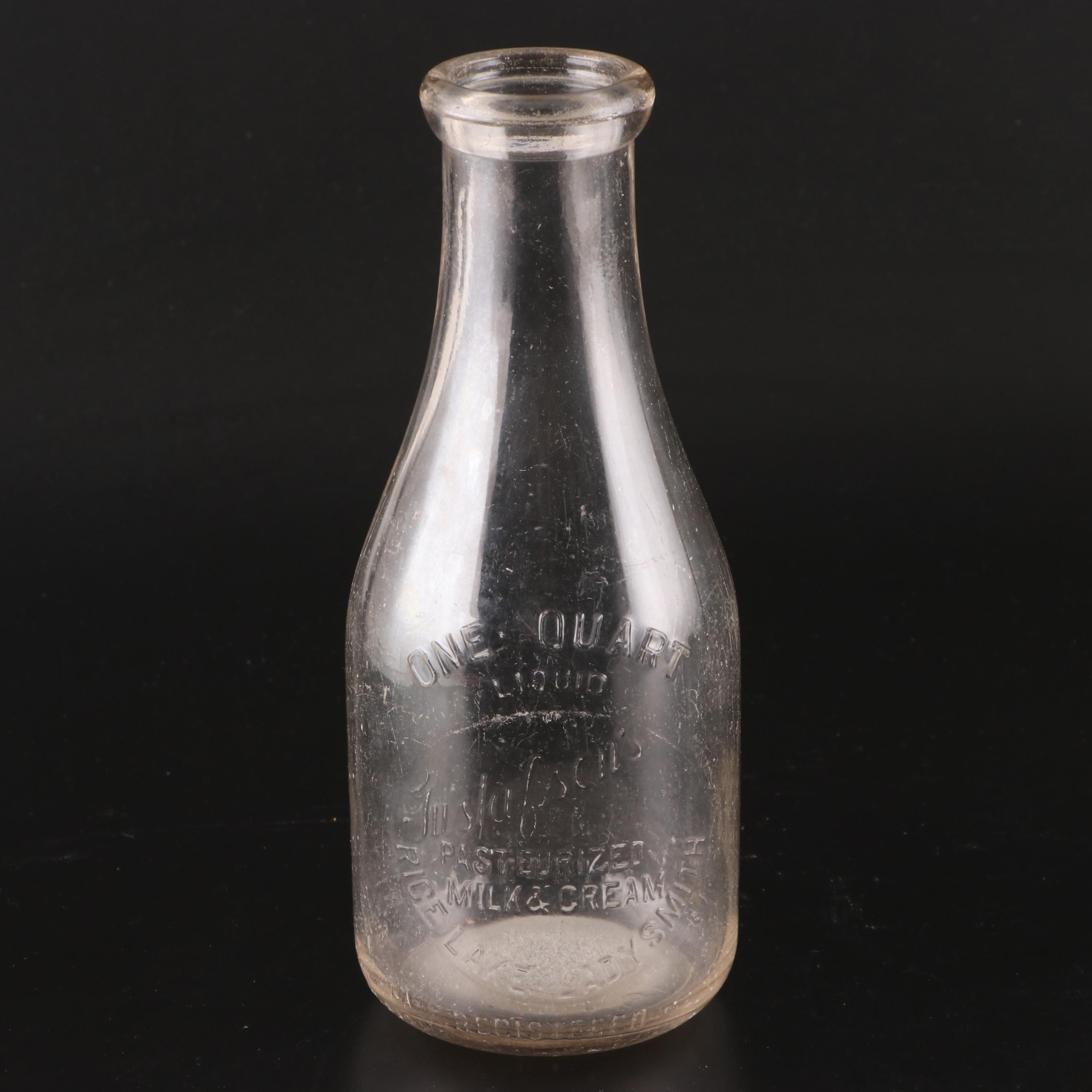 Gustafson's 1 Qt Glass Milk Jug with Laminated Cutout Stacked Pig Decor