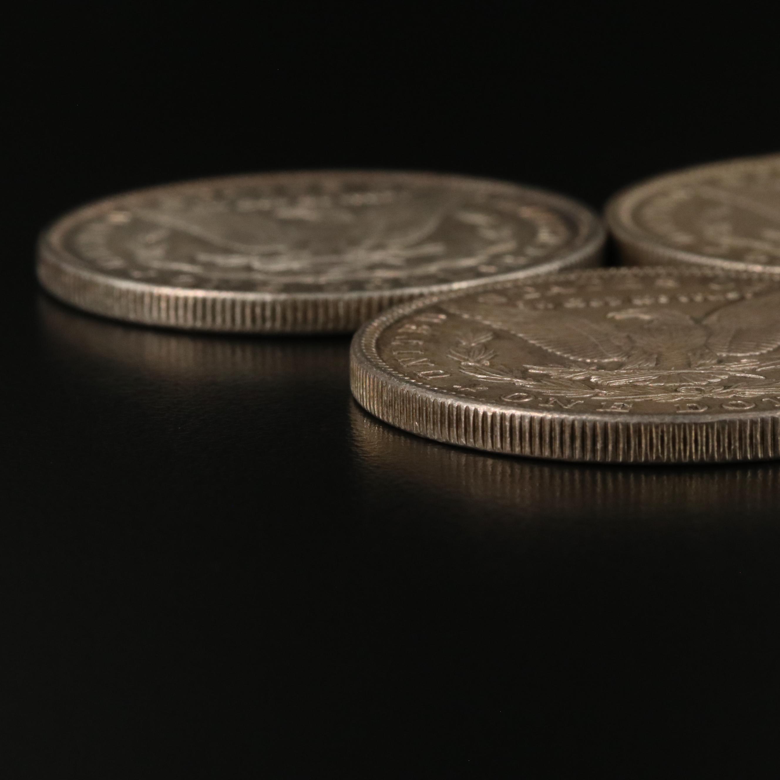 Three Morgan Silver Dollars Including 1879