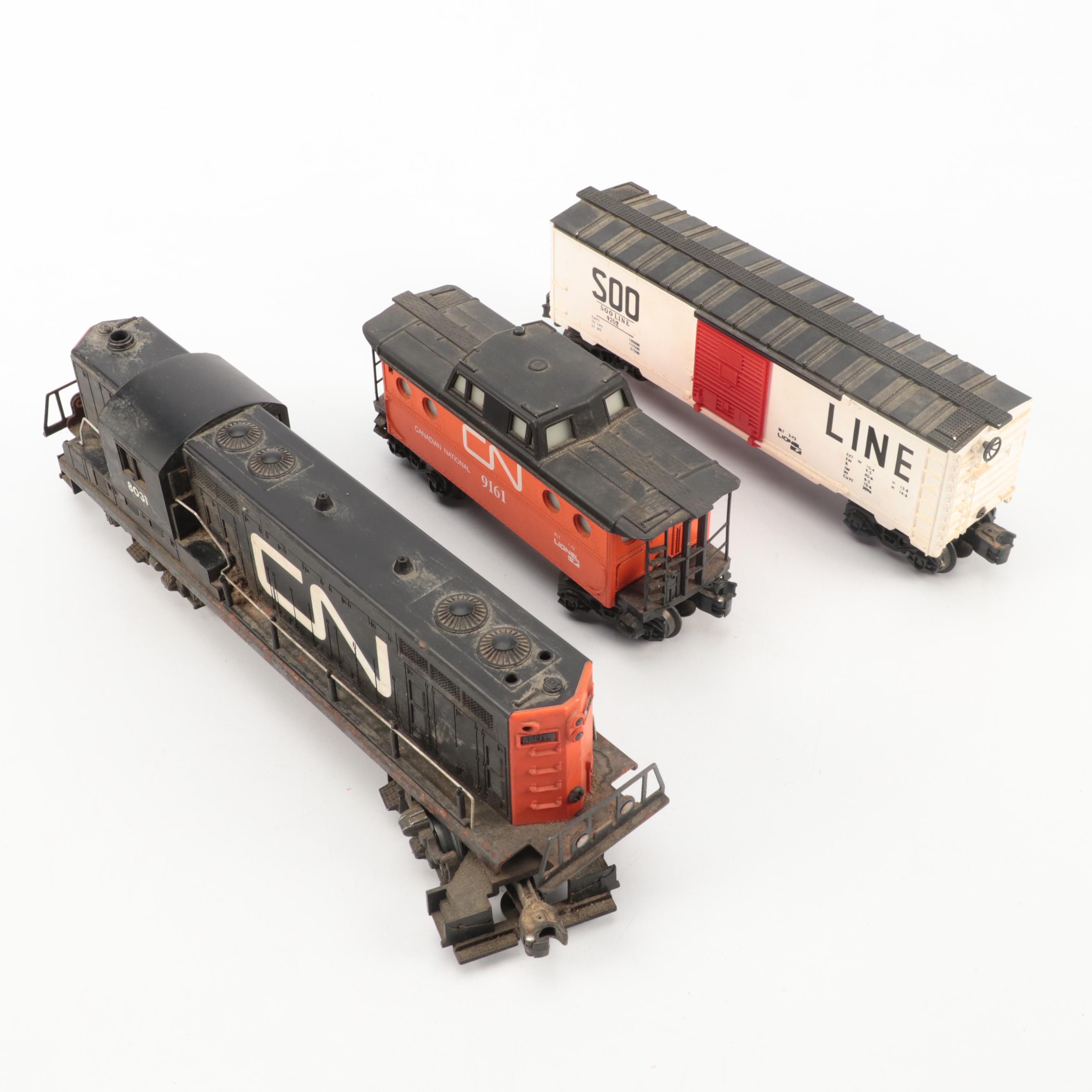 Lionel O Scale Locomotive and Cars with Model Building and Crane