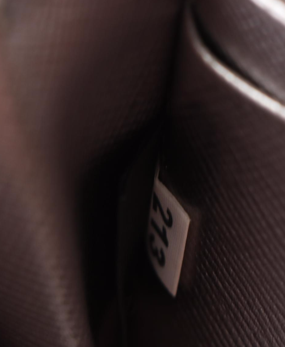 Prada Zip Wallet 1M1183 in Metallic Silver Saffiano Leather with Box