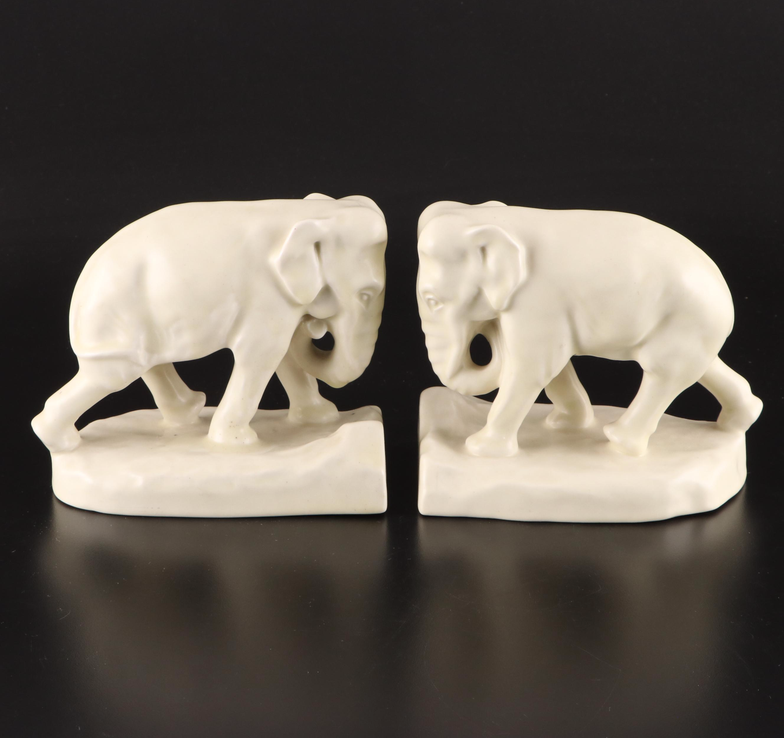 Rookwood Pottery Ivory Glaze Elephant Bookends with Bird on Leaf Figurine