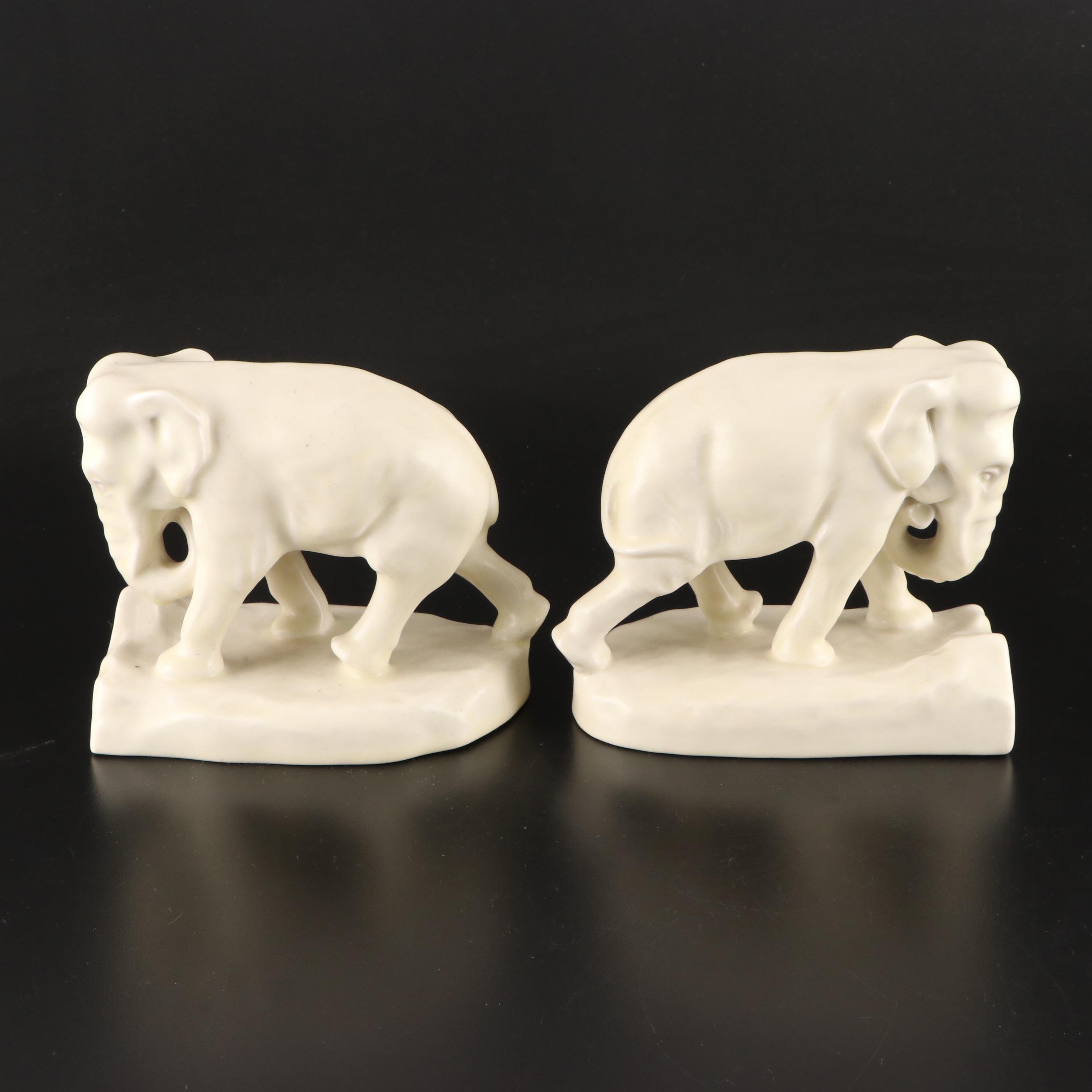 Rookwood Pottery Ivory Glaze Elephant Bookends with Bird on Leaf Figurine