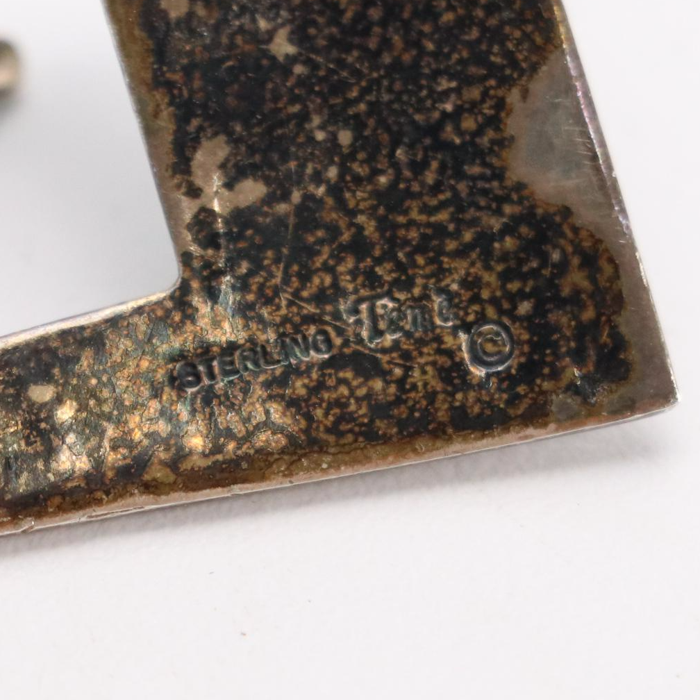 Temé Navajo Sterling Silver and Inlaid Belt Buckle on Alexander's Leather Belt