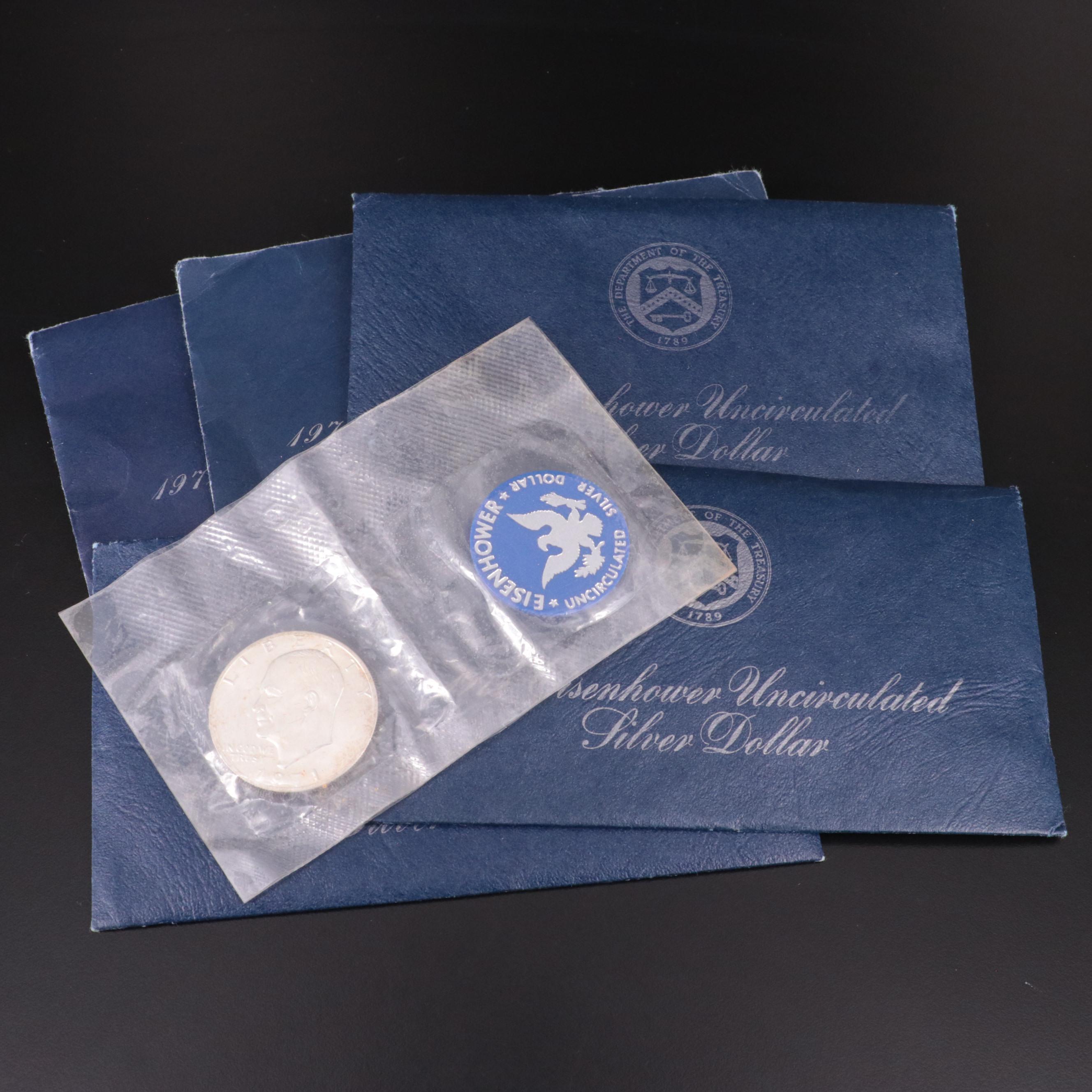 Six Uncirculated Eisenhower Silver Dollars