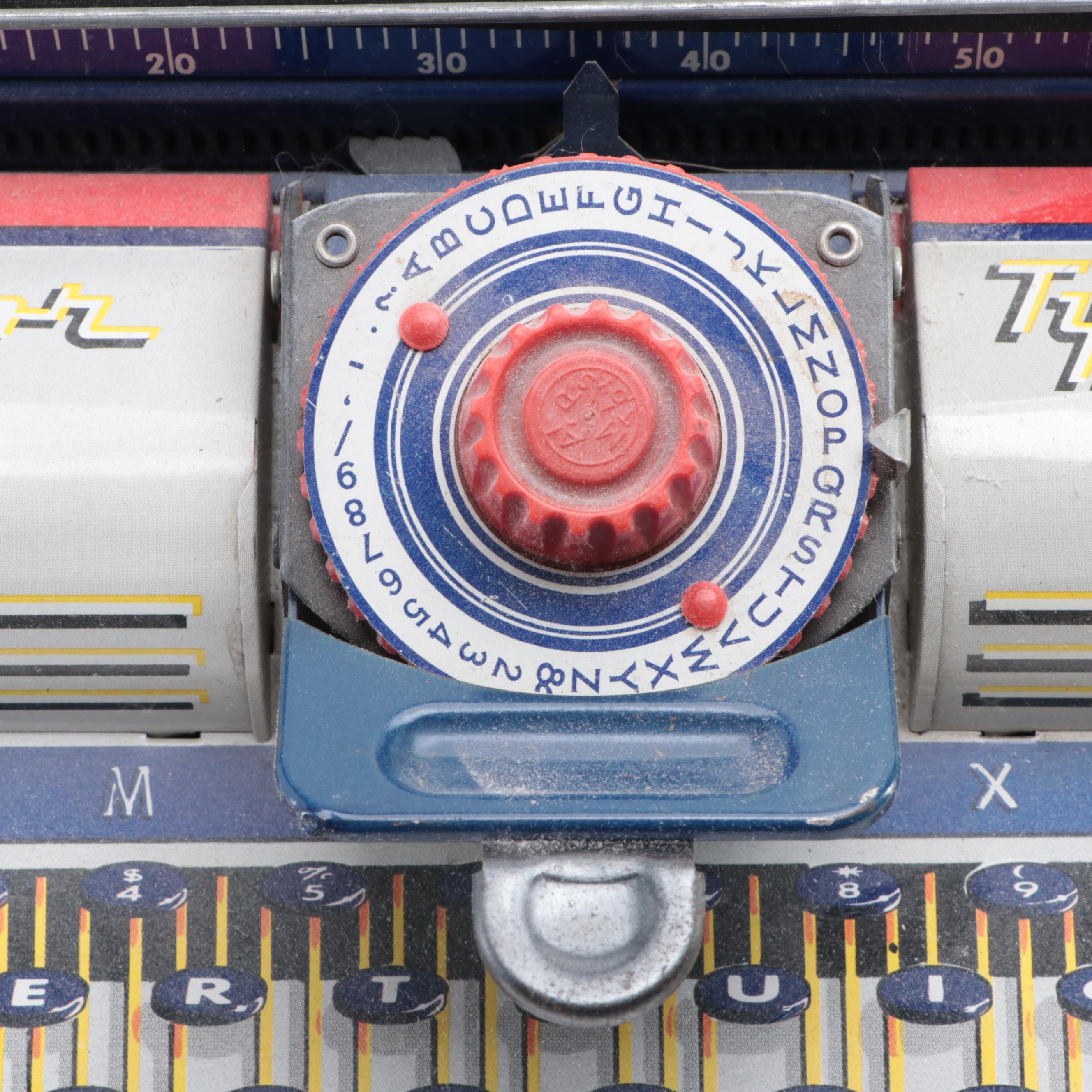 Marx Tin Lithograph “Junior" Dial Typewriter, Mid-20th Century
