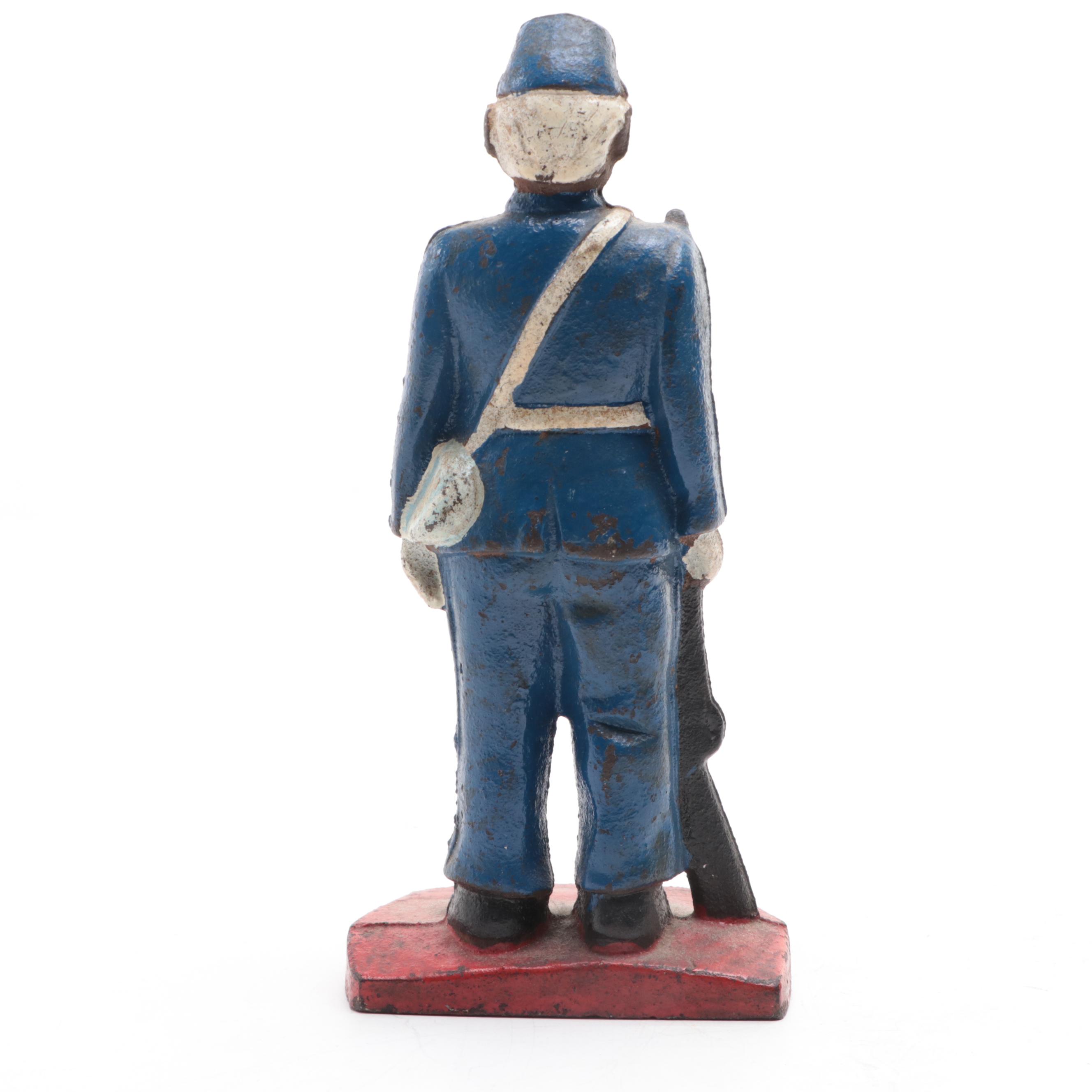 Painted Cast Iron Union Soldier Bookend and Other Polychrome Metal Figurine