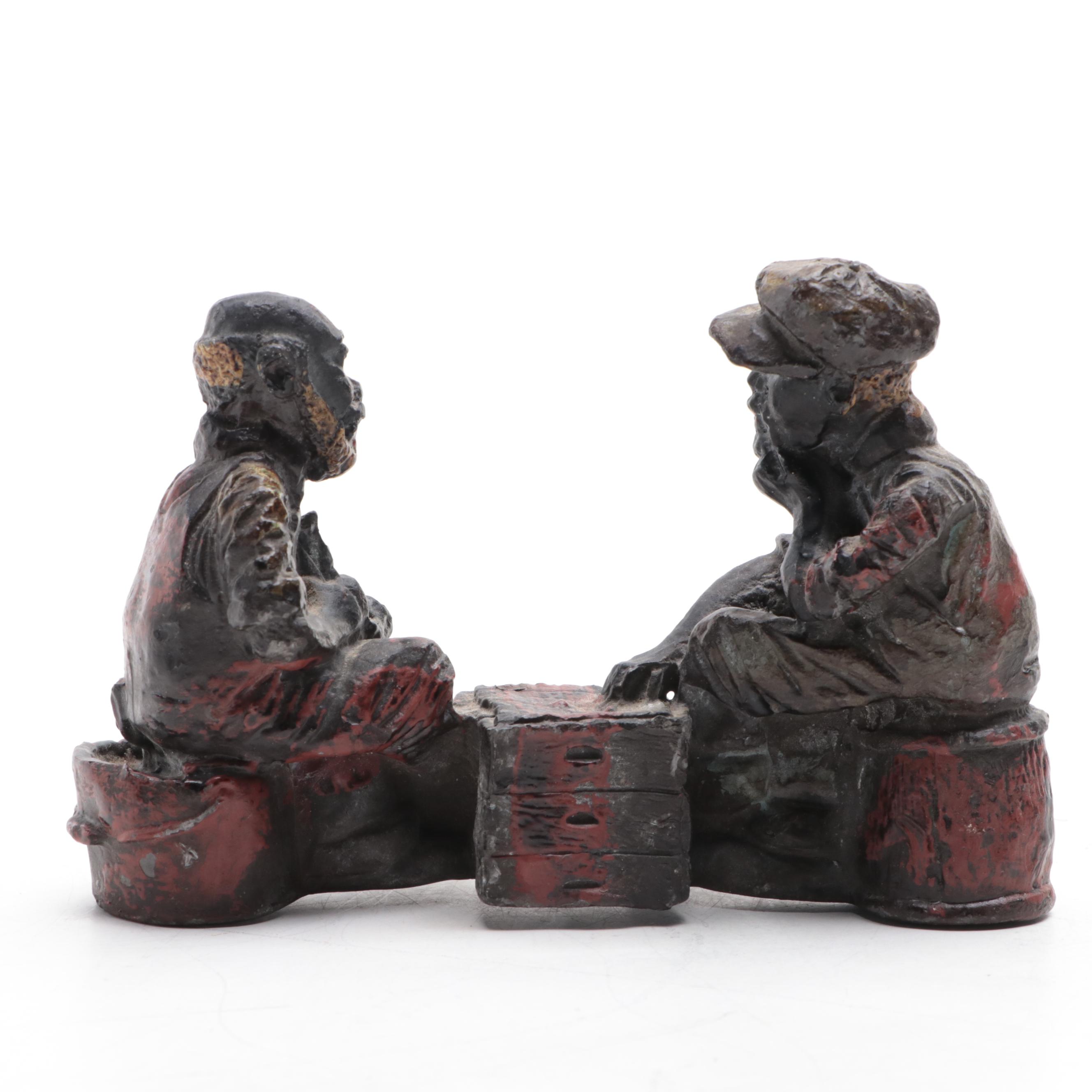 Painted Cast Iron Union Soldier Bookend and Other Polychrome Metal Figurine