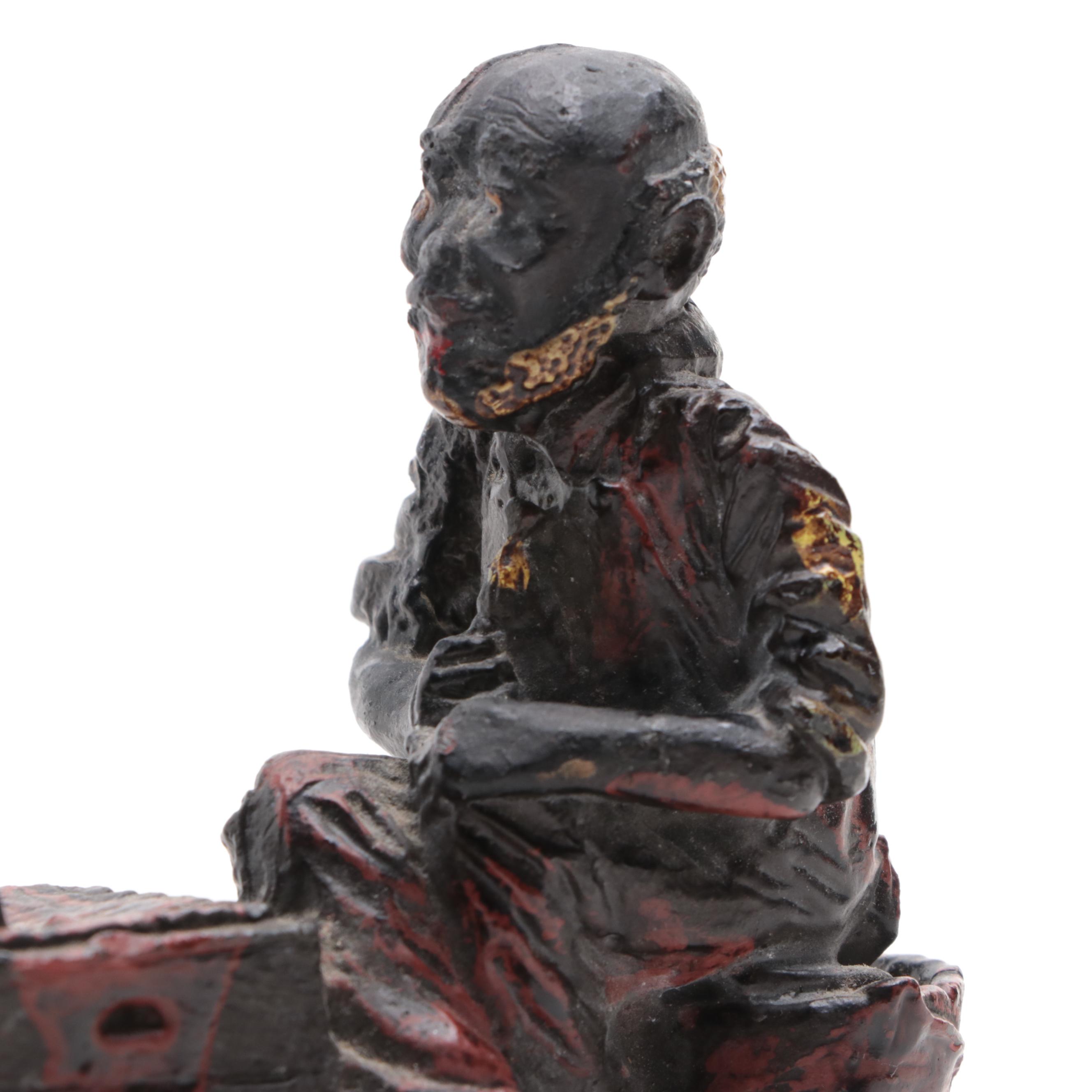 Painted Cast Iron Union Soldier Bookend and Other Polychrome Metal Figurine