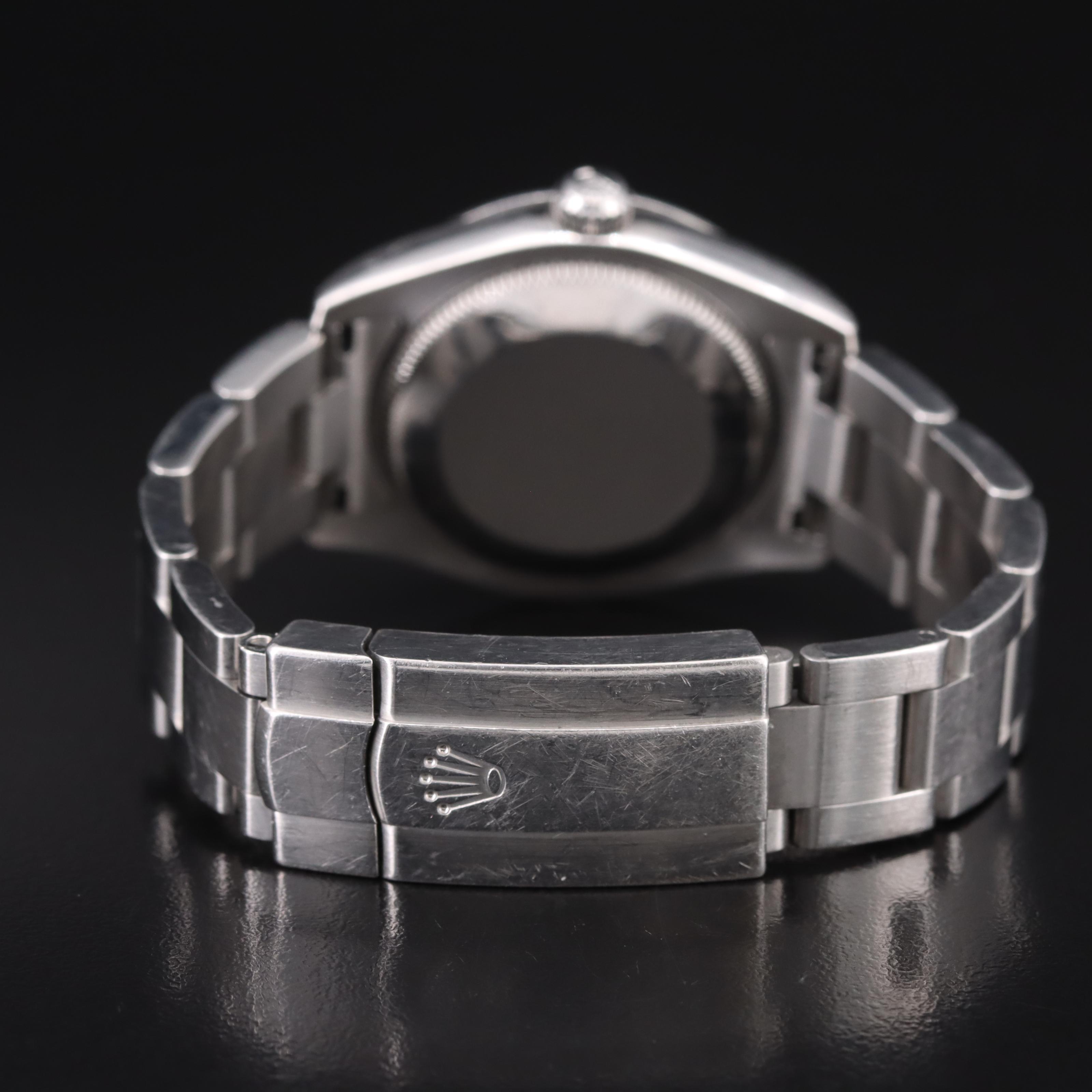 Rolex Oyster Perpetual Black Arabic and Blue Markers Dial Watch