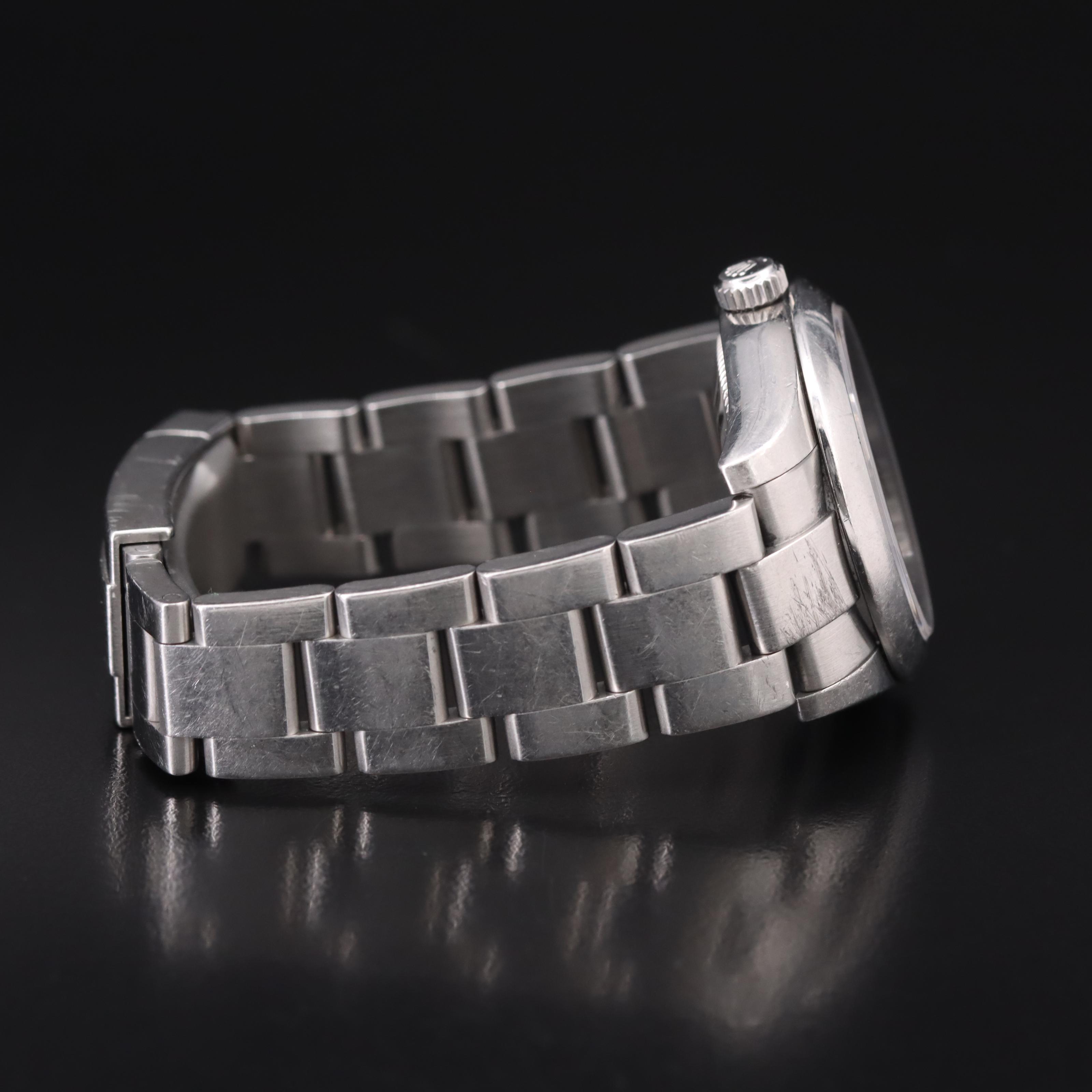 Rolex Oyster Perpetual Black Arabic and Blue Markers Dial Watch