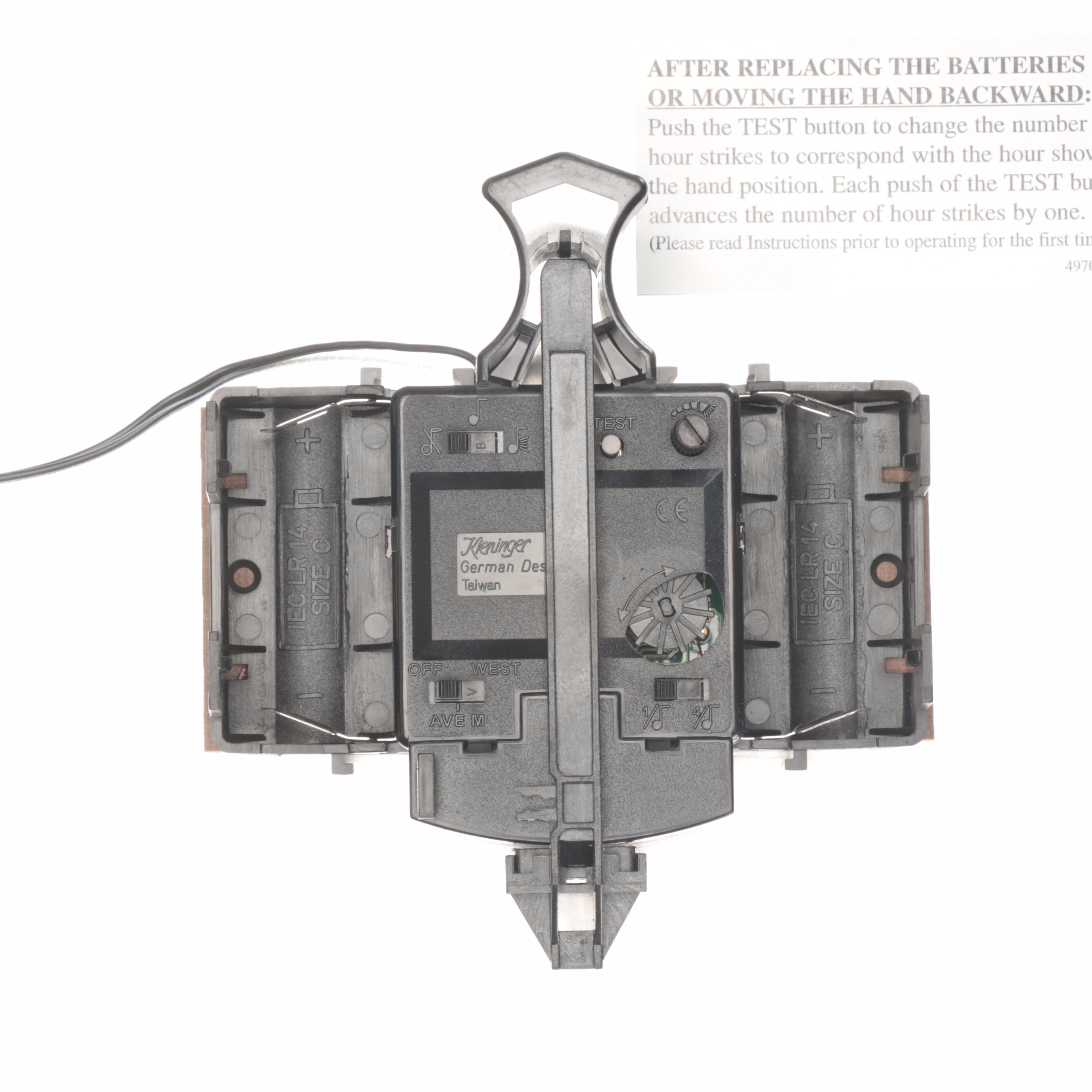 Howard Miller "Maxwell" Cherry Battery Operated Wall Clock