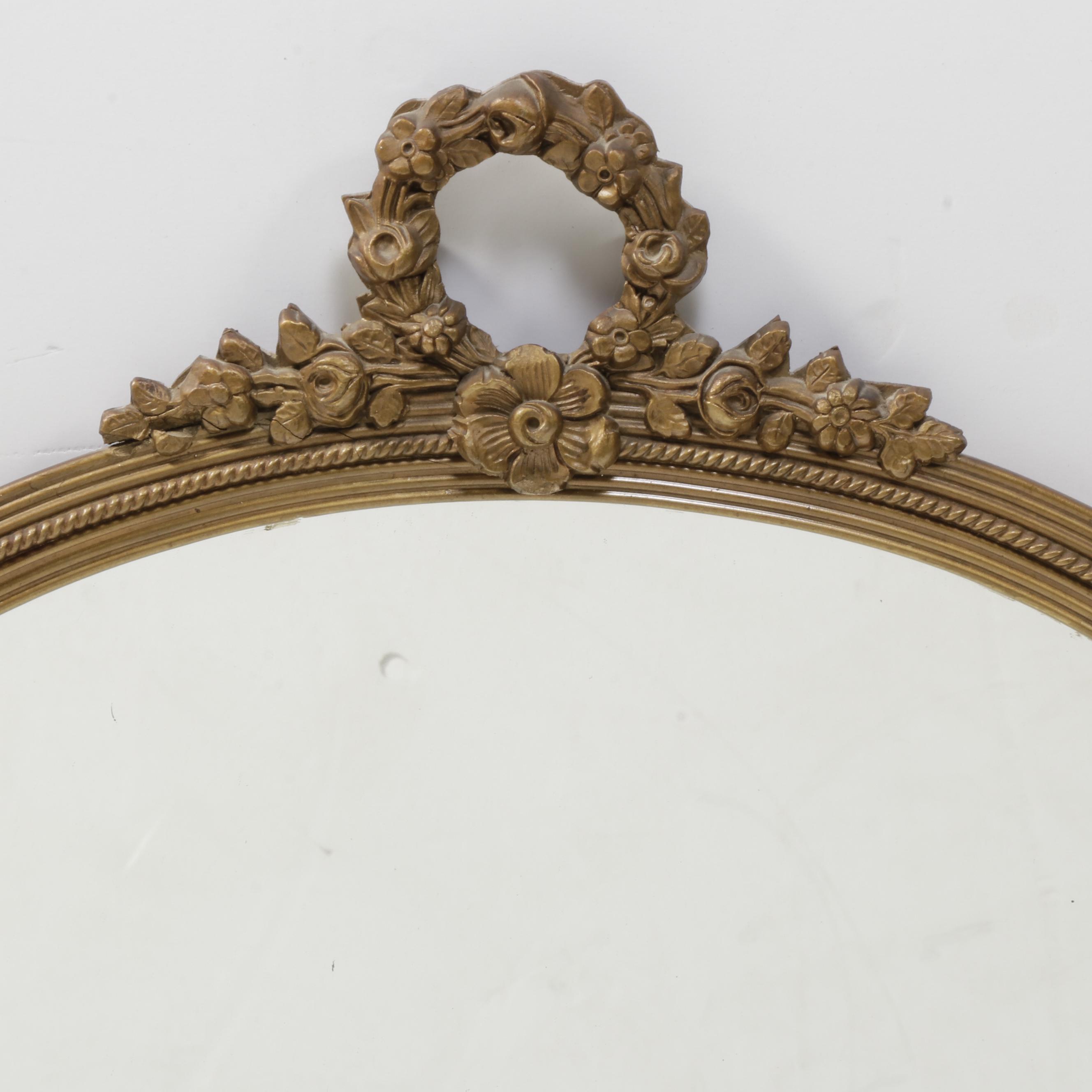 H. Neuer Glass Co. Floral Carved Wood Framed Oval Wall Mirror, Mid-20th Century