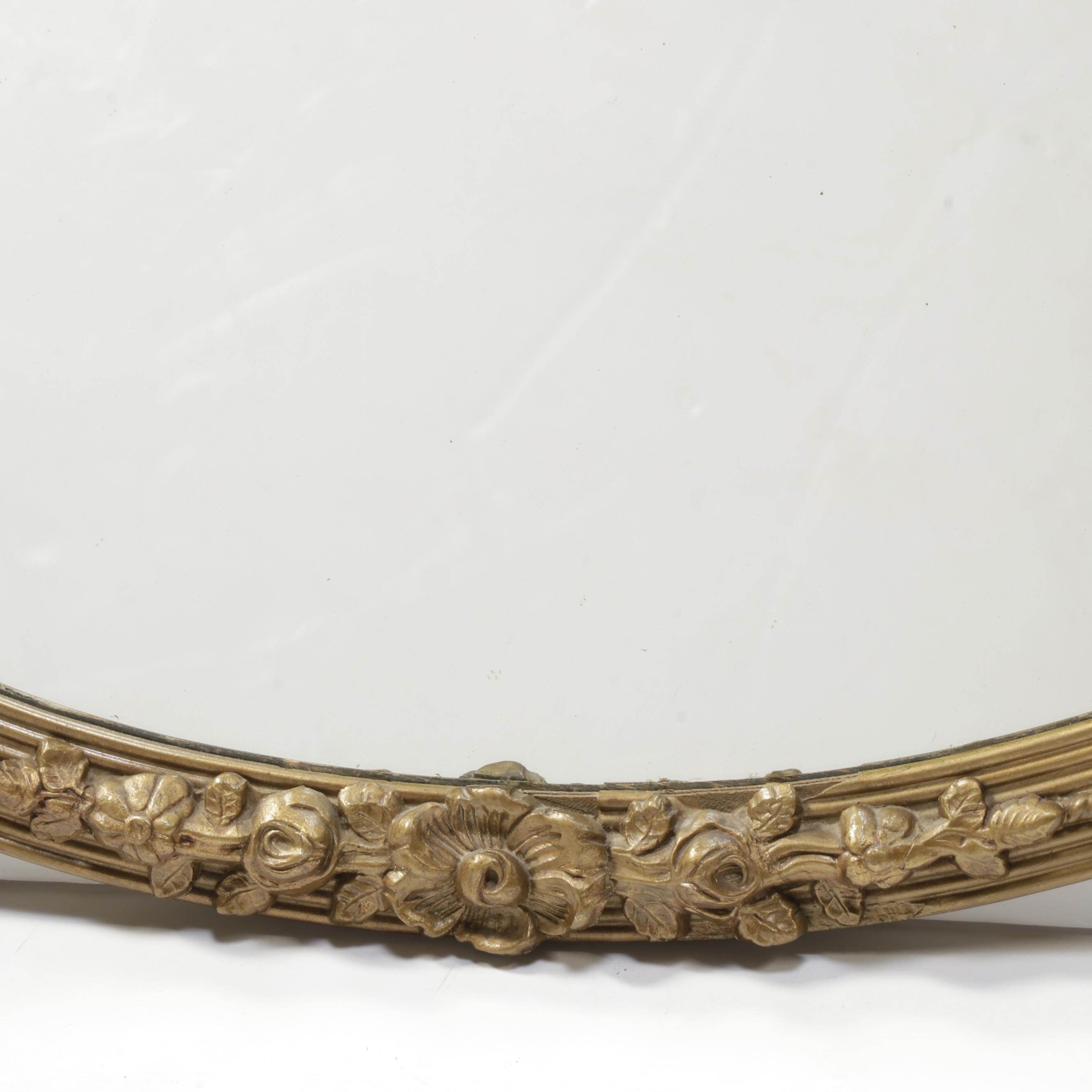 H. Neuer Glass Co. Floral Carved Wood Framed Oval Wall Mirror, Mid-20th Century