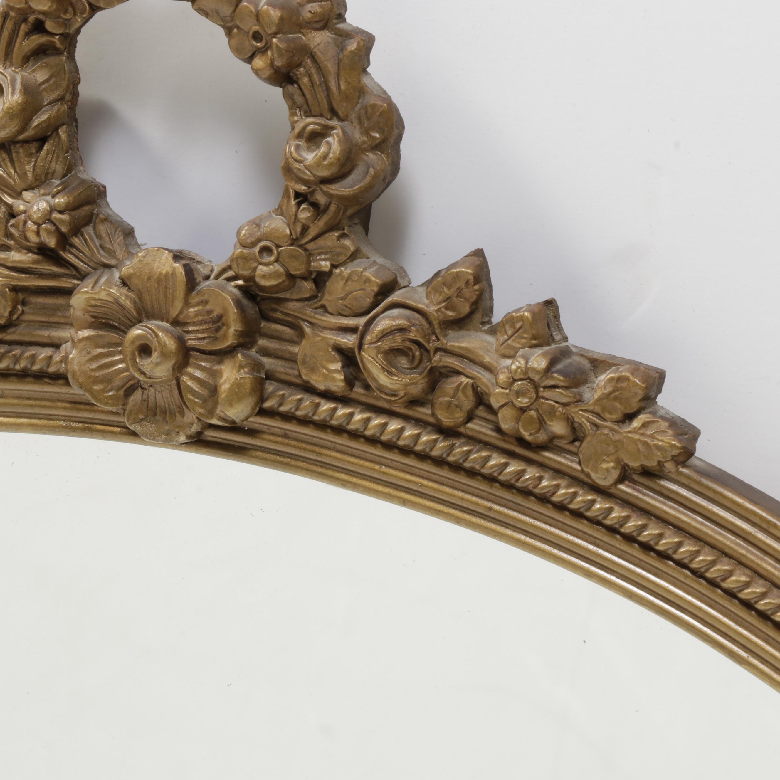 H. Neuer Glass Co. Floral Carved Wood Framed Oval Wall Mirror, Mid-20th Century