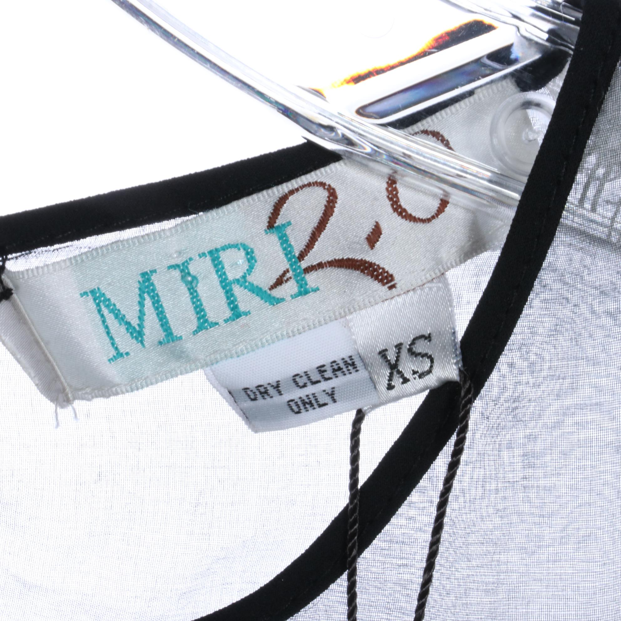 Line & Dot Gold Sequin Maxi Skirt with Nina McLemore Blazer and Other Tops