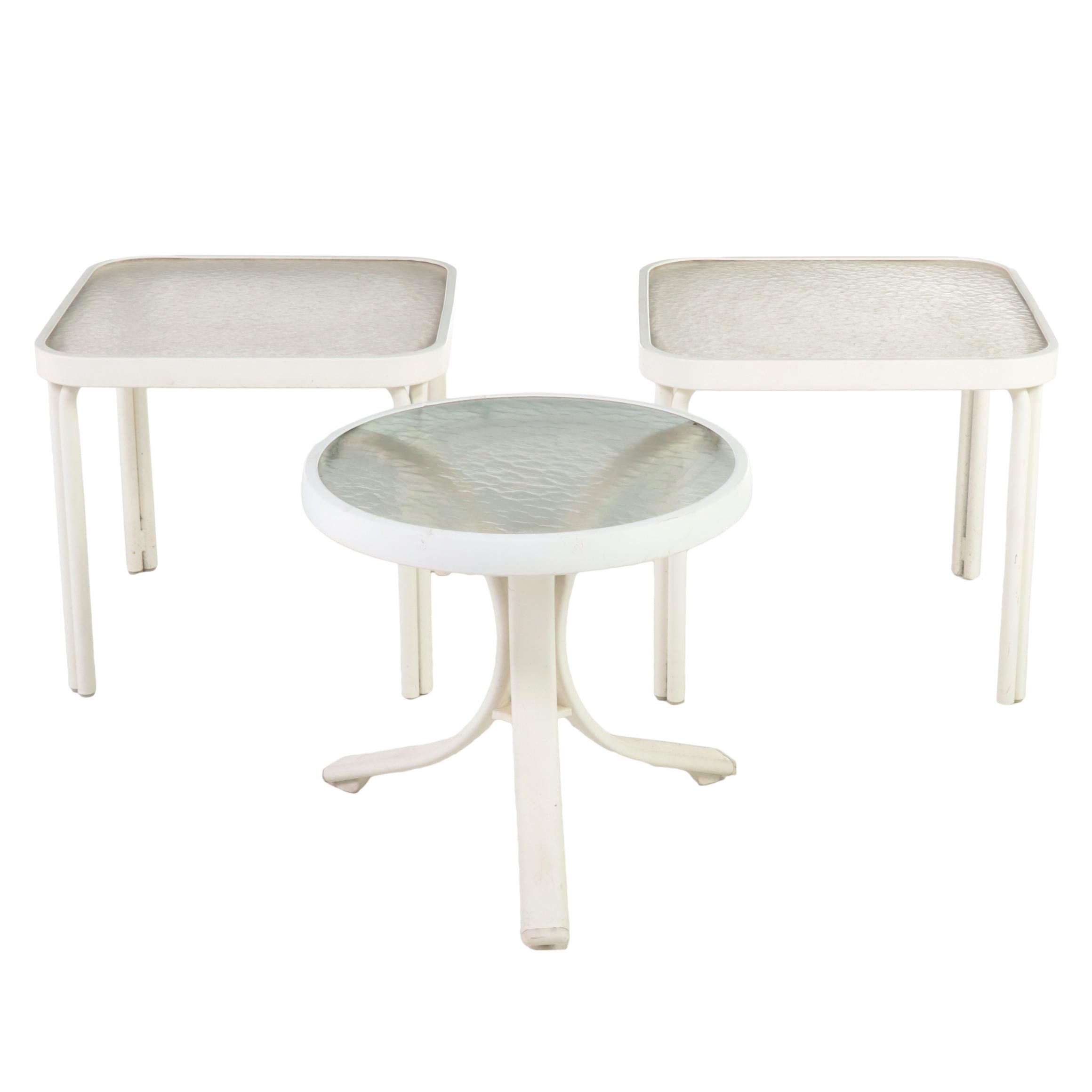 Three Metal and Glass Patio Tables