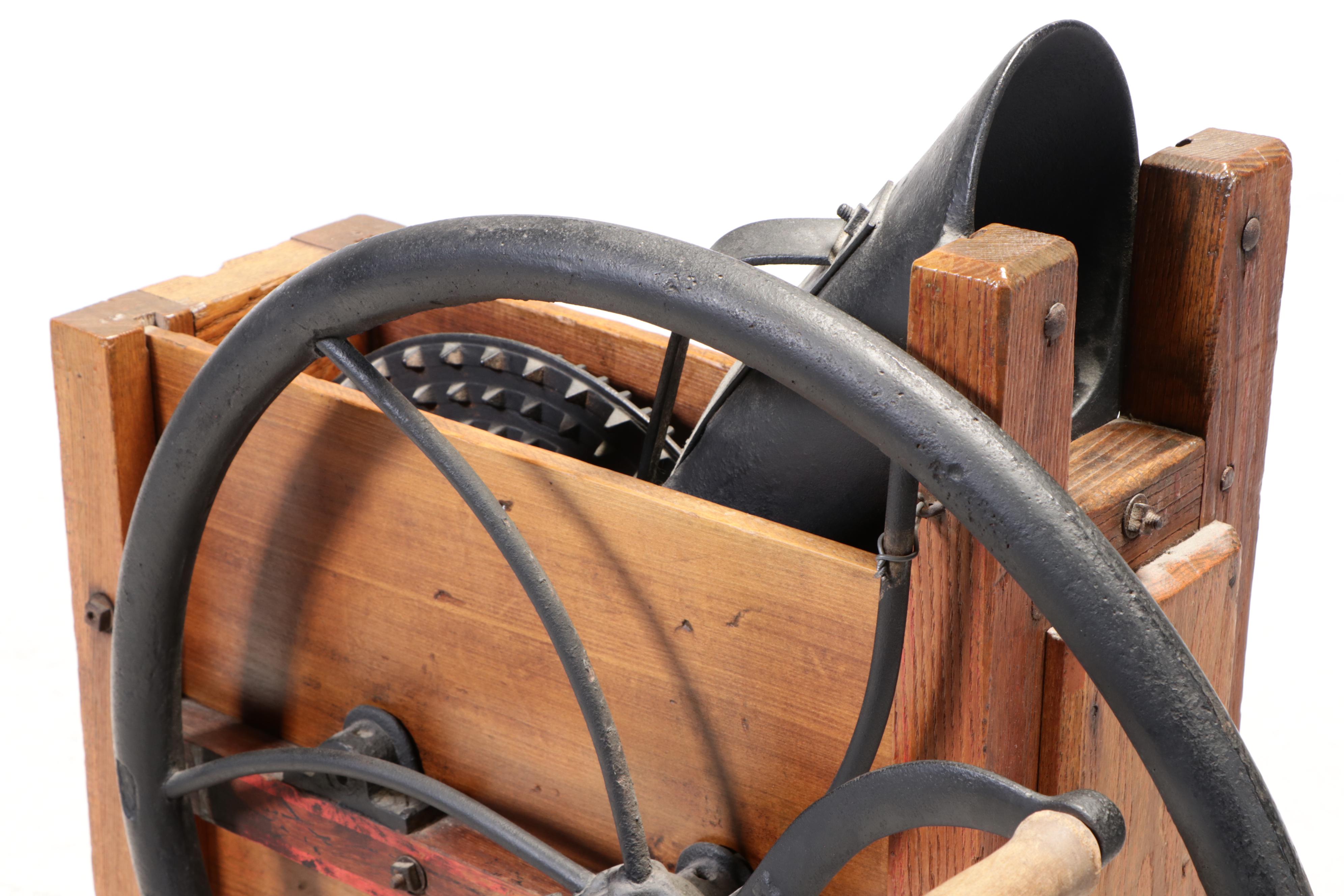 American Primitive Oak, Poplar, and Cast Iron Corn Shucker