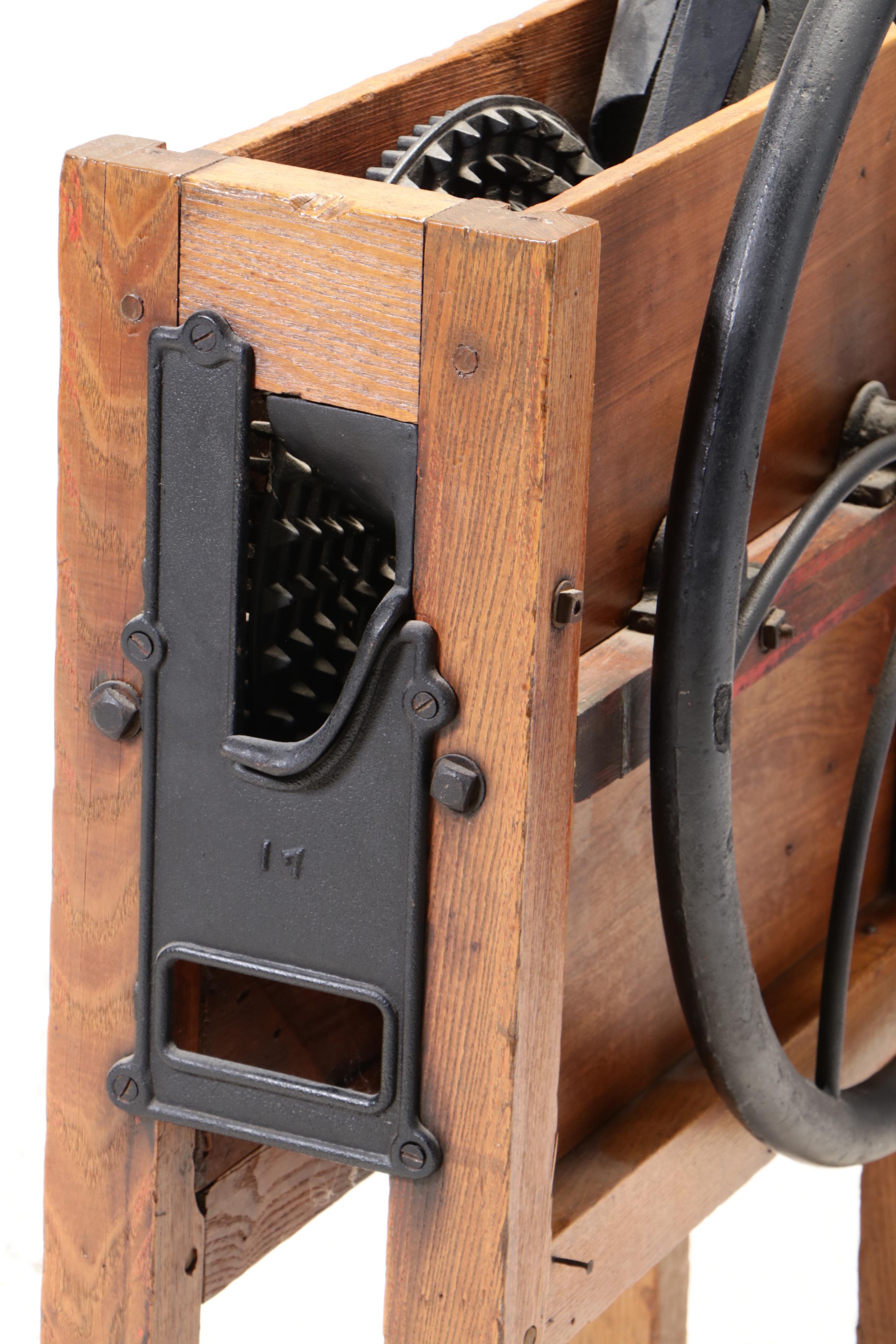 American Primitive Oak, Poplar, and Cast Iron Corn Shucker