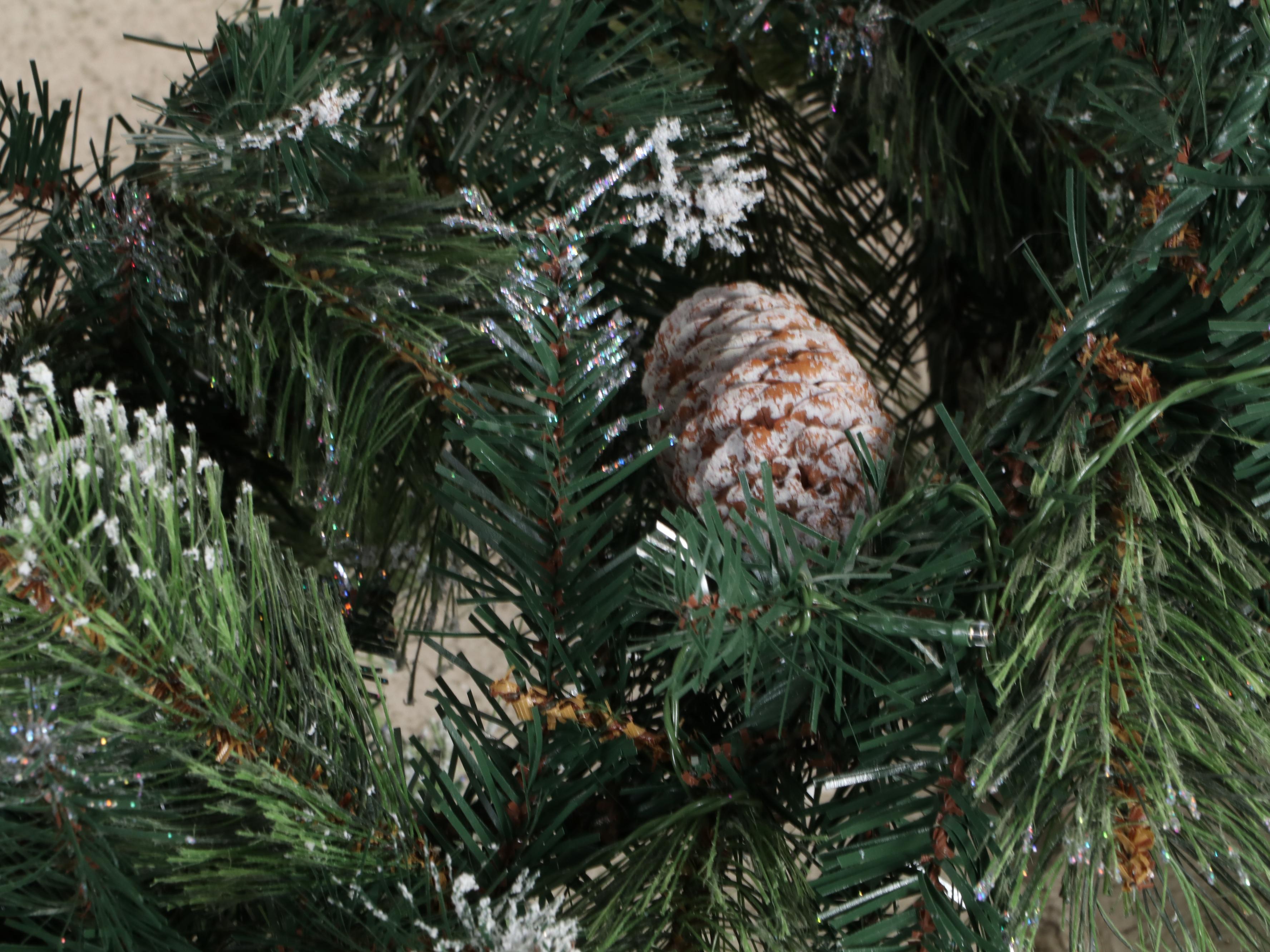 Glittering Illuminated Grapevine Reindeer Figures With Faux Evergreen Garland