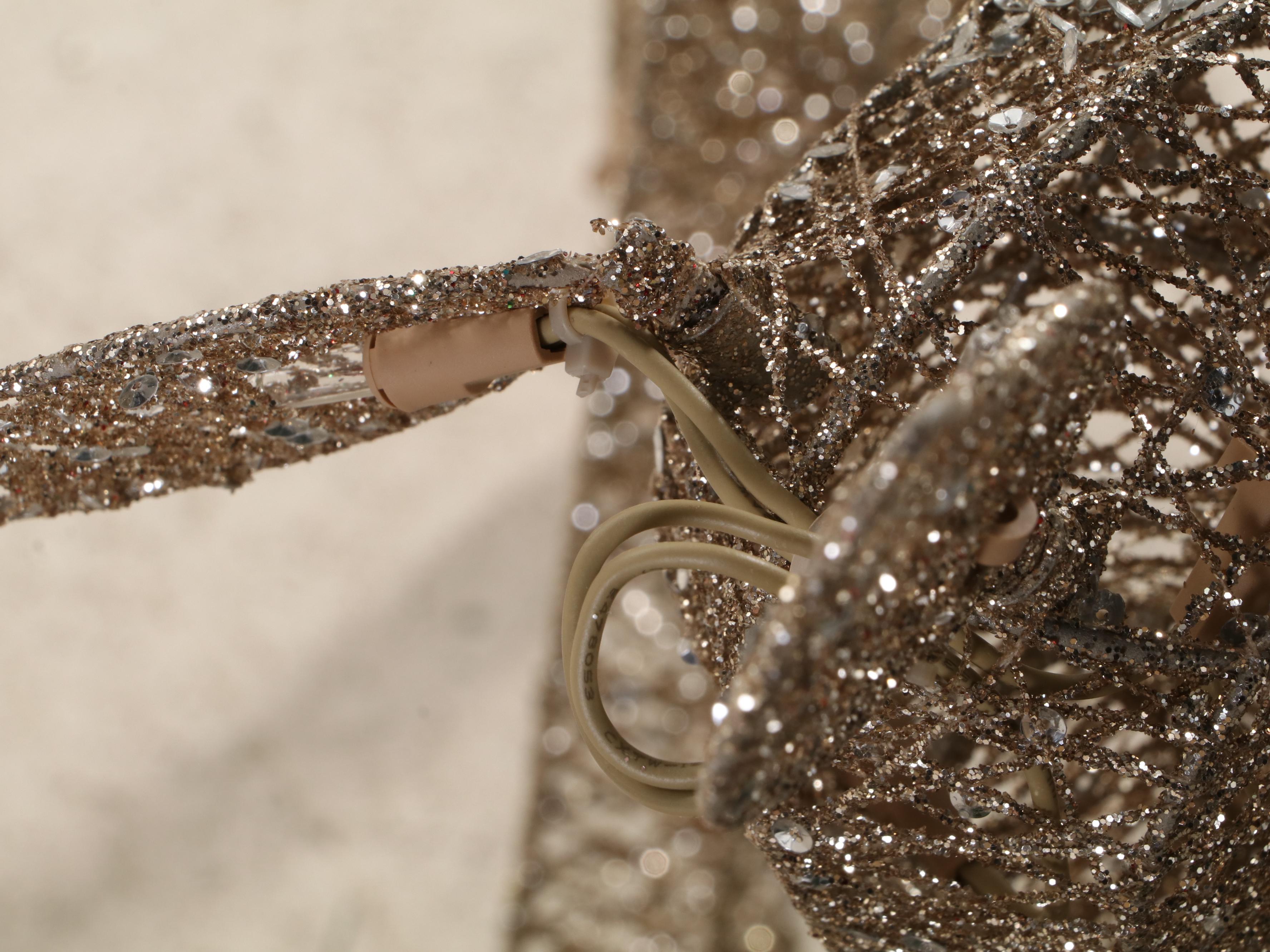 Glittering Illuminated Grapevine Reindeer Figures With Faux Evergreen Garland