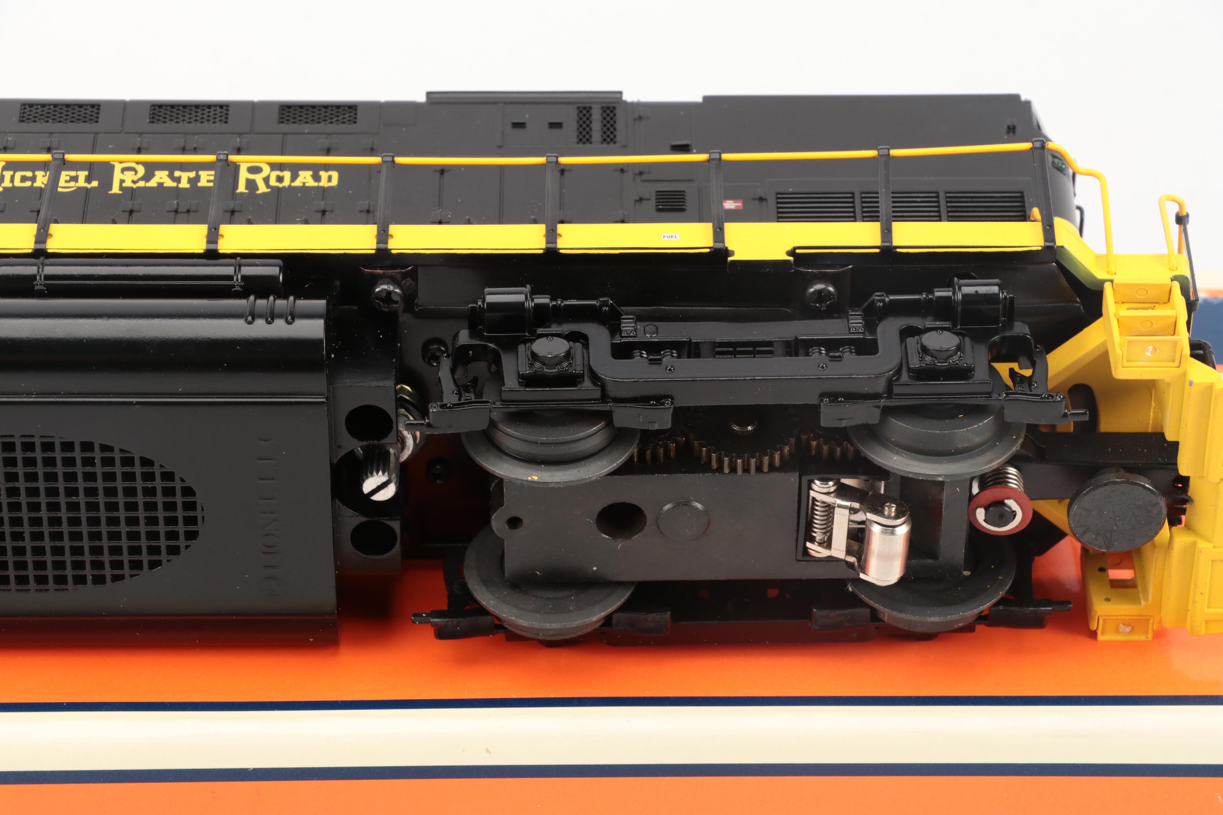 Lionel and M.T.H. Nickel Plate Road Diesel Engine, Caboose and More