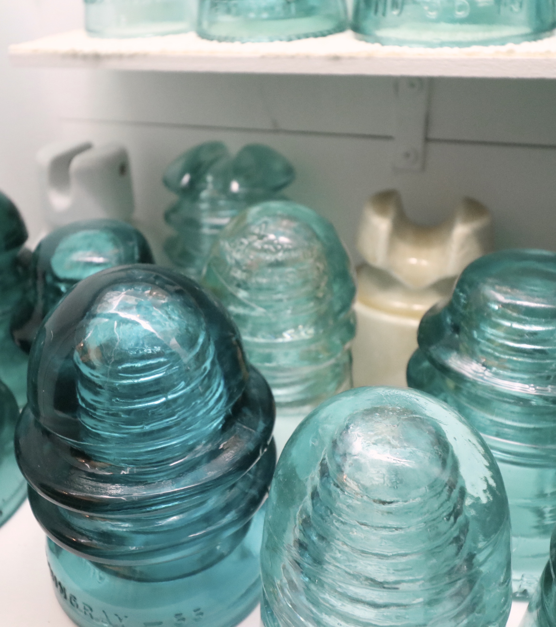 Handcrafted Curio Cabinet Featuring an Insulator Collection