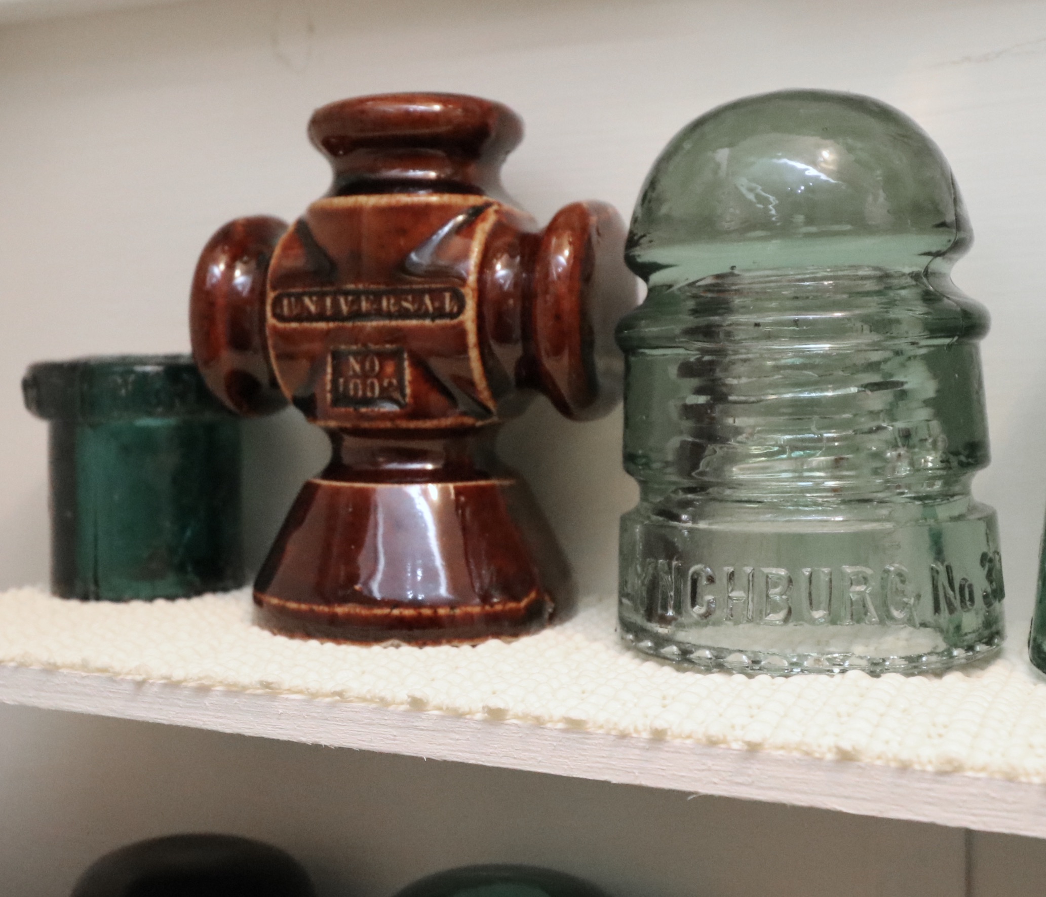 Handcrafted Curio Cabinet Featuring an Insulator Collection