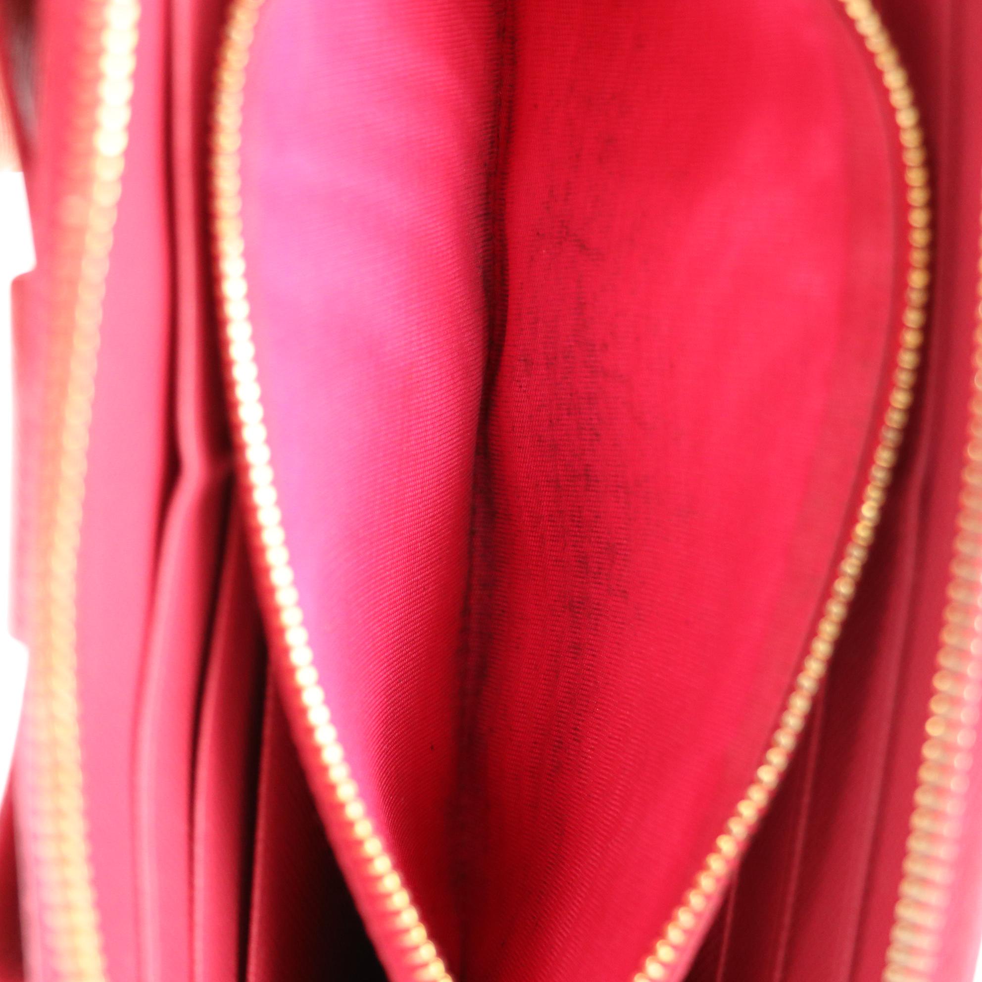 Prada Zip-Around Bow Wallet 1M0506 in Saffiano Leather