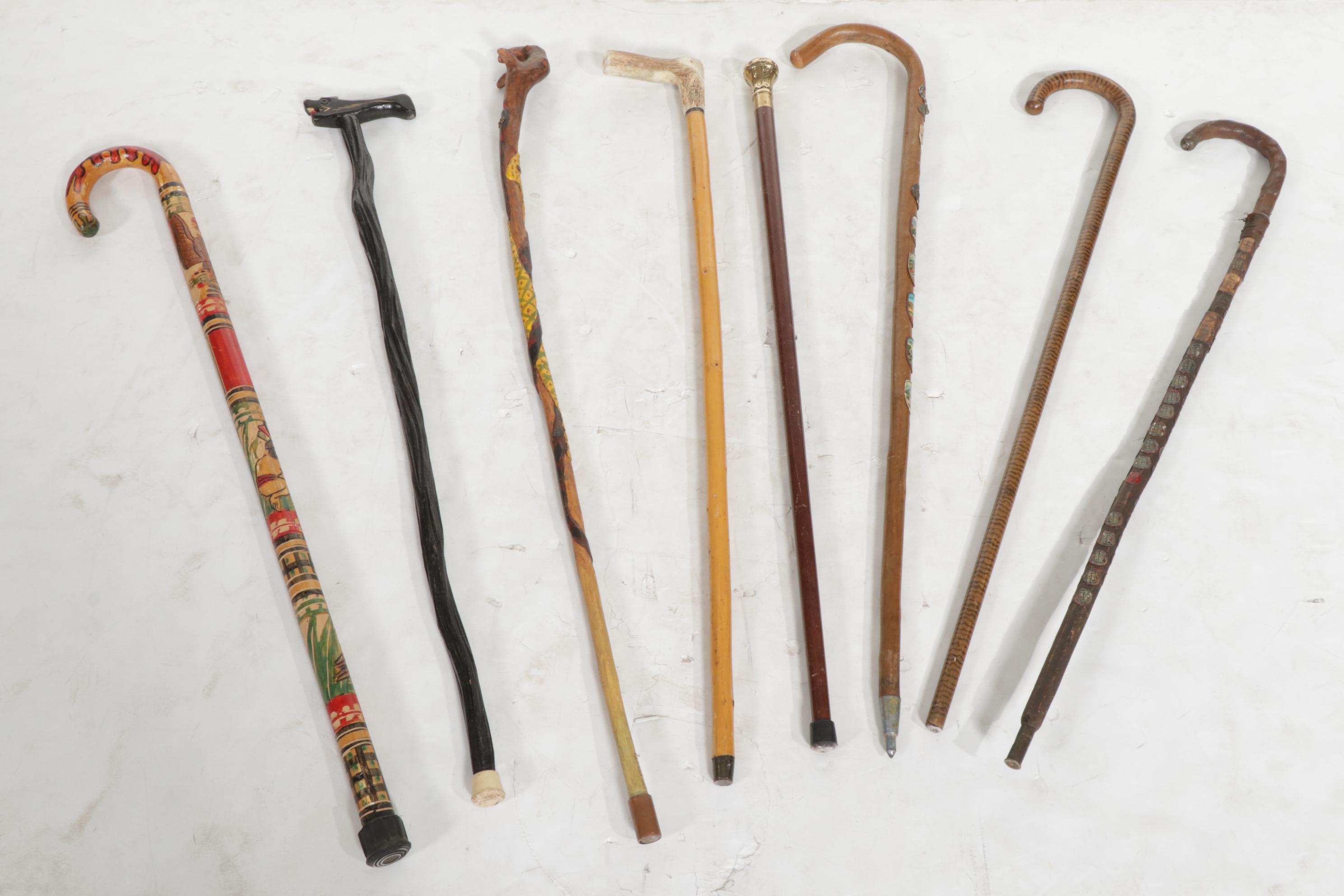 Majolica Umbrella Stand with Six Eclectic Canes, One Gold Plate Walking Stick