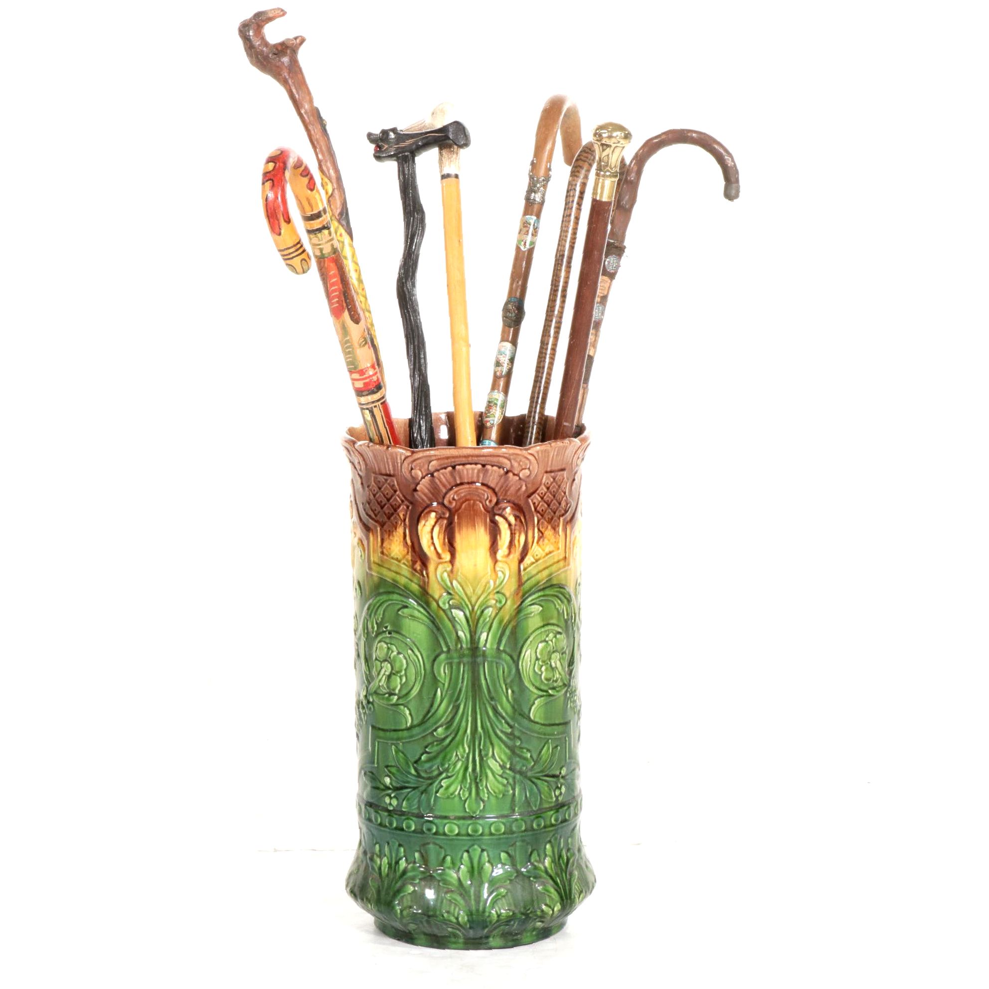 Majolica Umbrella Stand with Six Eclectic Canes, One Gold Plate Walking Stick