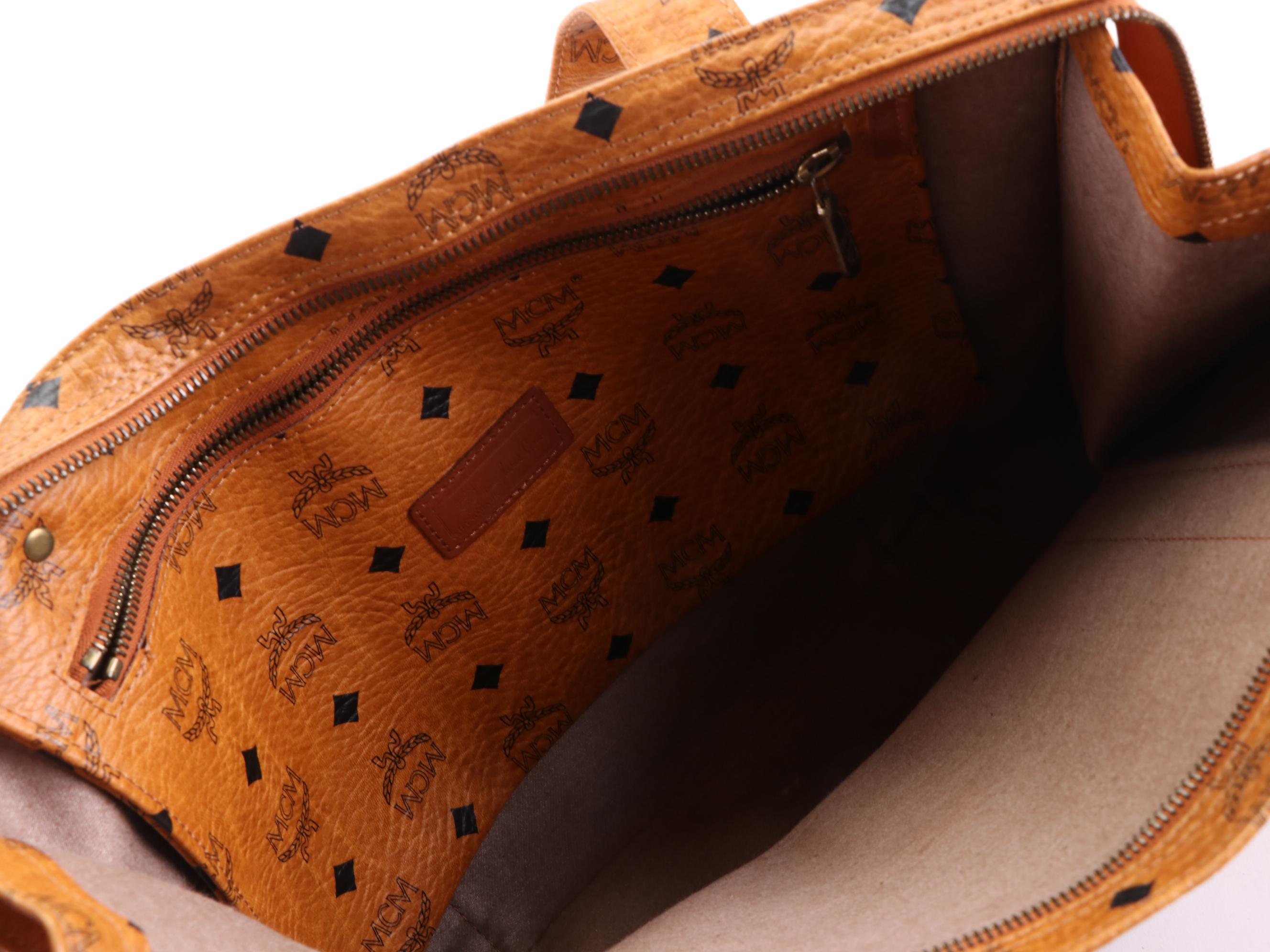 MCM Heritage Zippered Shopper Tote Bag in Cognac Visetos Coated Canvas