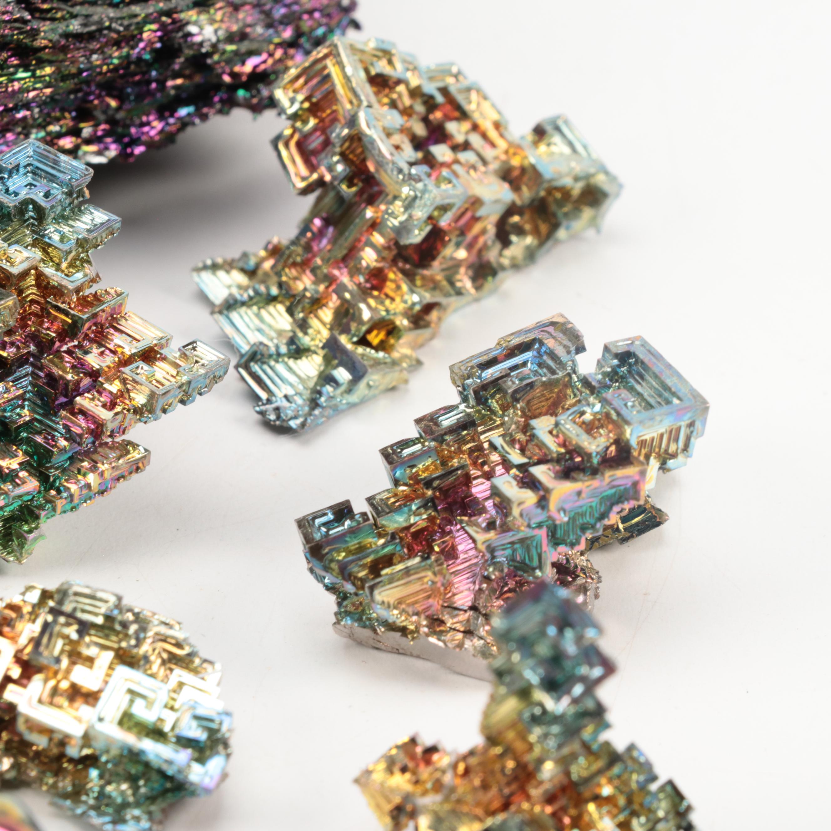 Polished and Raw Bismuth and Titanium Quartz Mineral Specimens