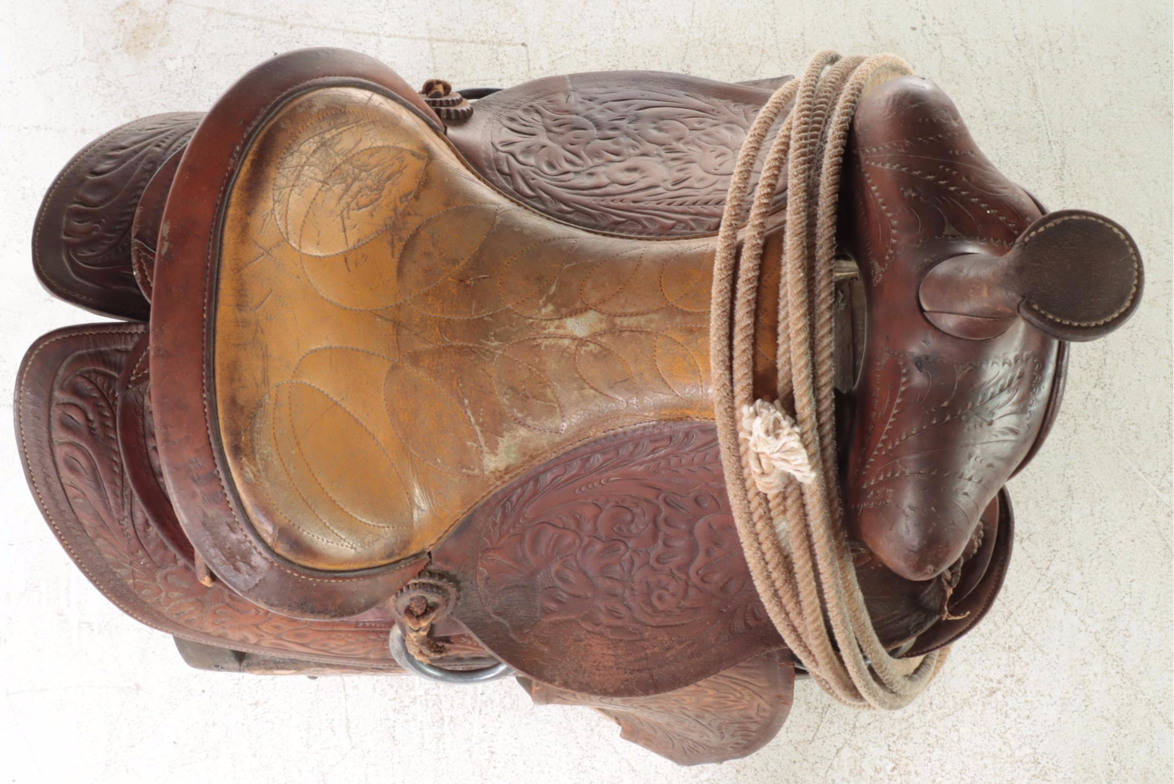 Tooled Leather Western Saddle with Stand and Roping Lasso