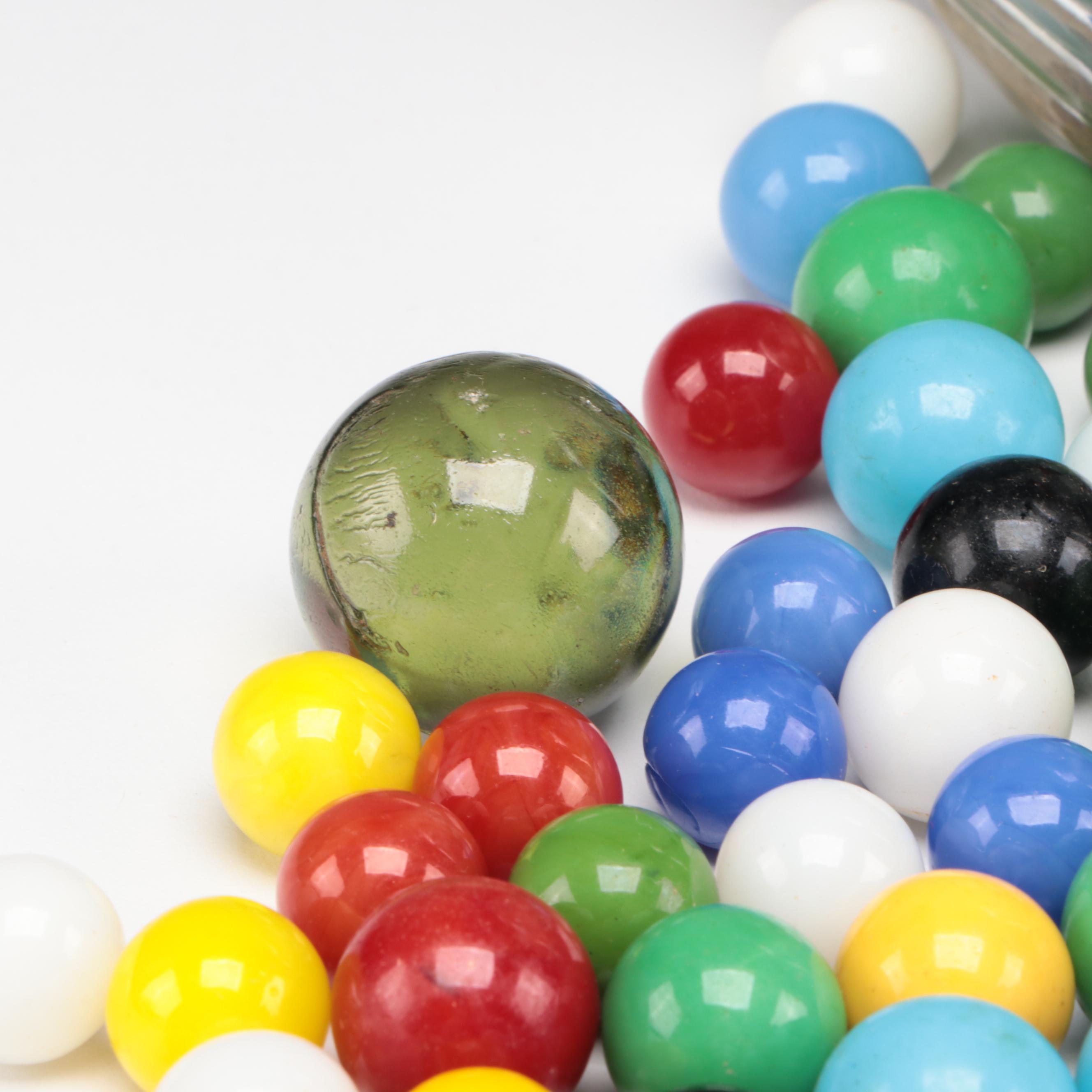 Cadmium and Uranium Glass Marbles With Swirlies and More