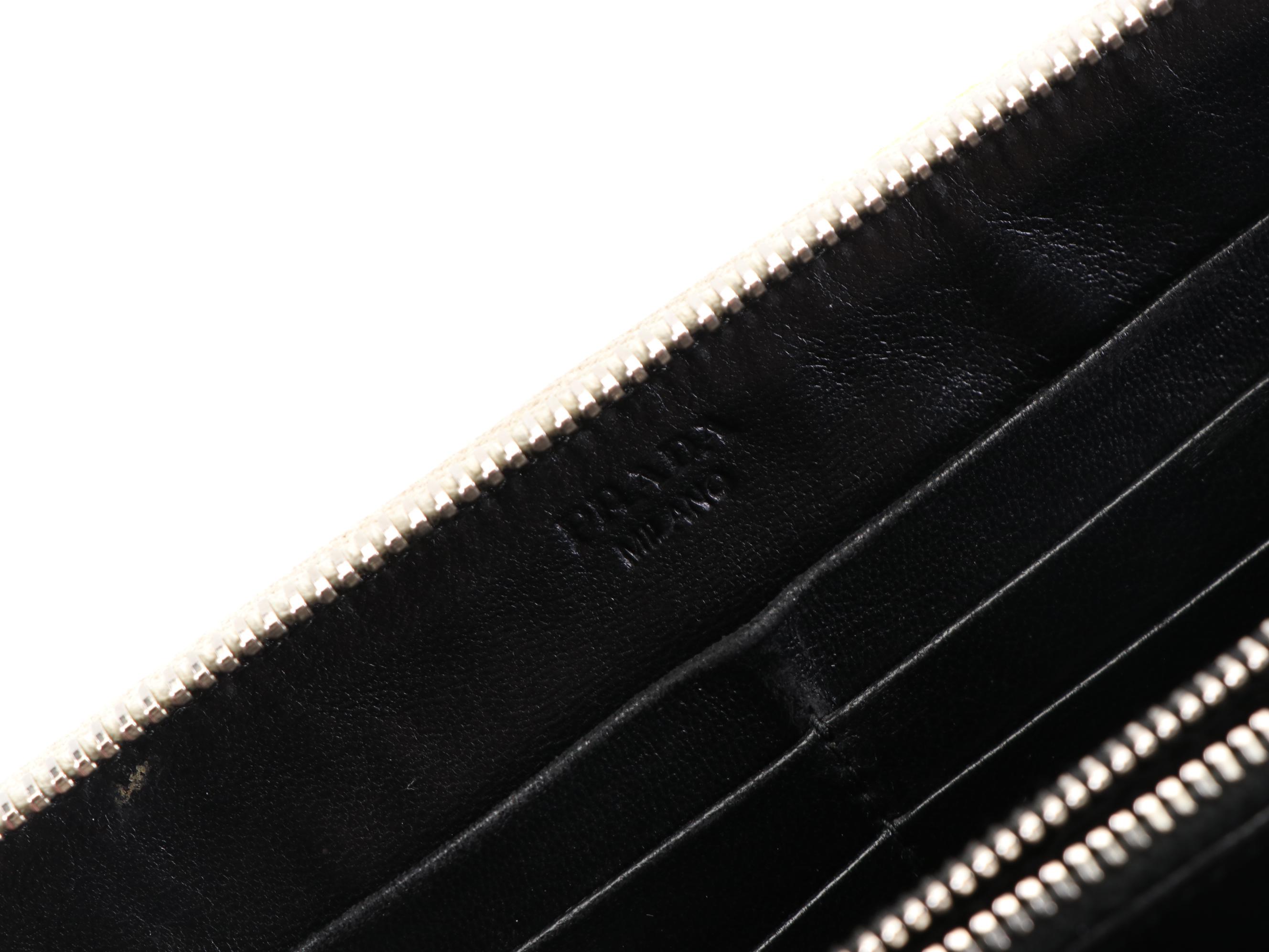 Prada Studded Zippy Wallet 1M0506 in Patent Leather with Box