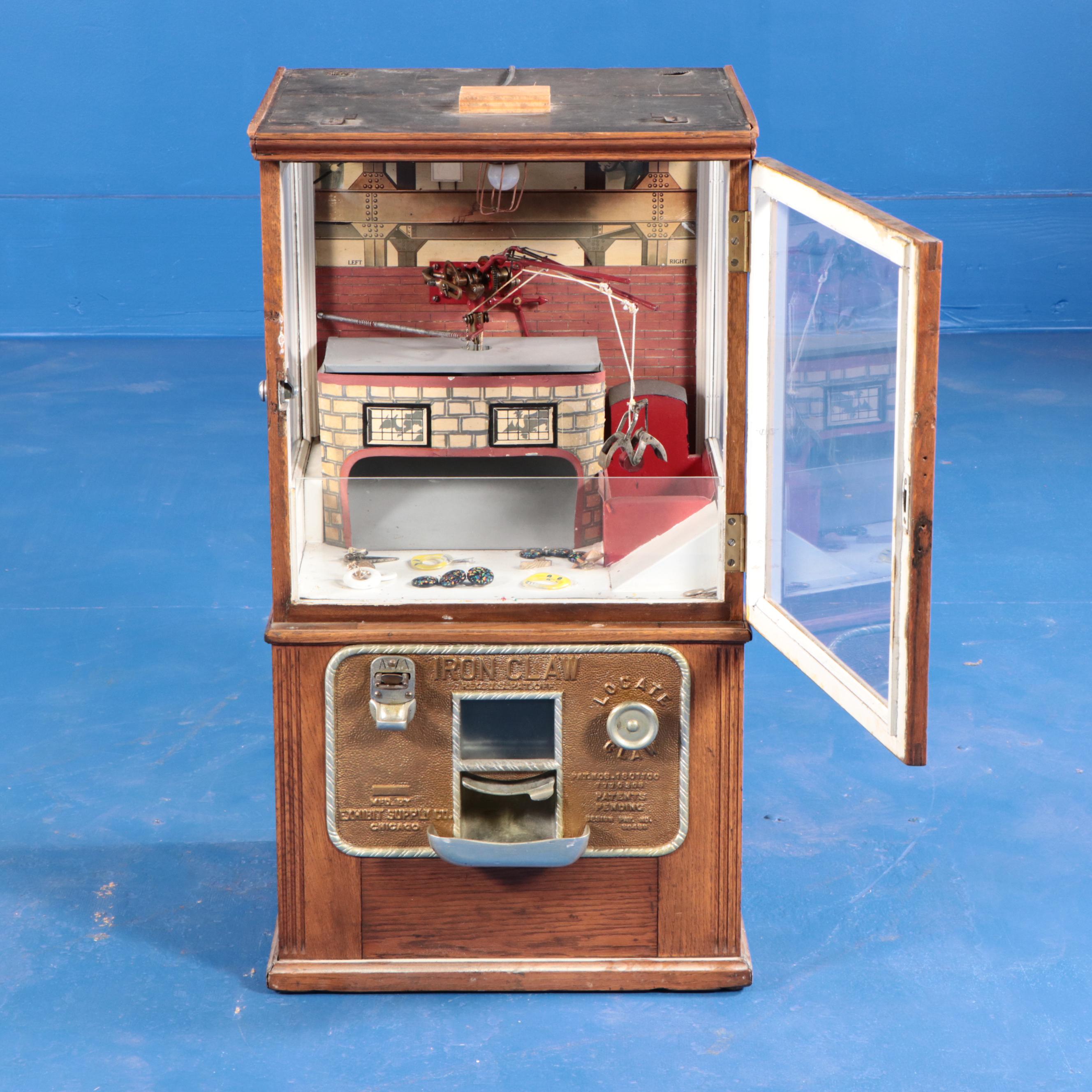 Exhibit Supply Co. Iron Claw Oak Cased Arcade Claw Machine, Early 20th Century
