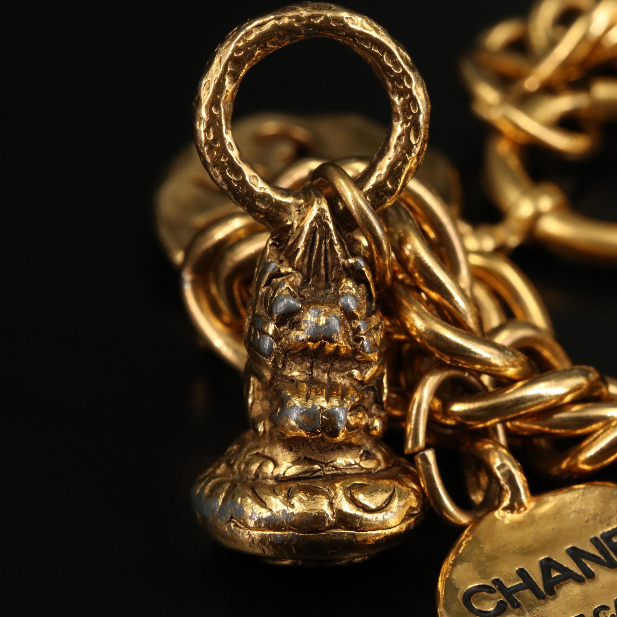 Chanel Gold Tone Charm Bracelet