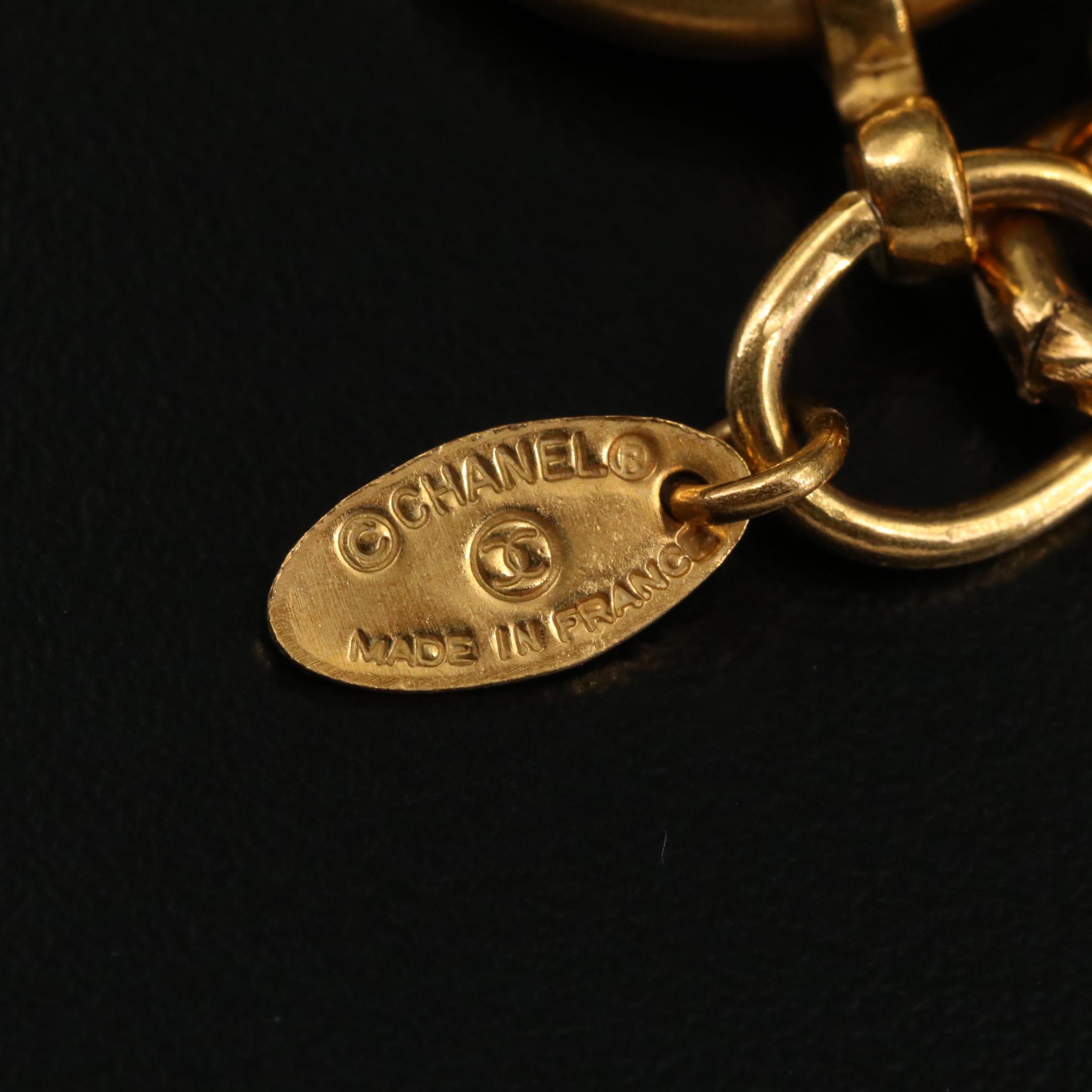 Chanel Gold Tone Charm Bracelet