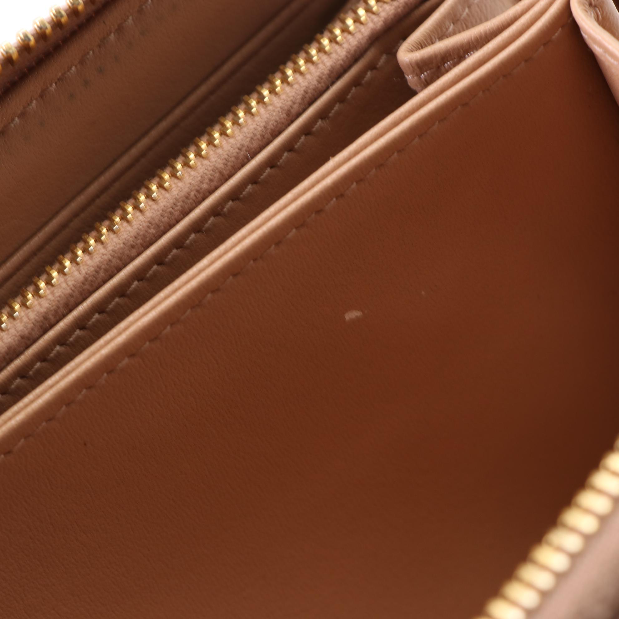 Prada Textured Leather Zip-Around Wallet