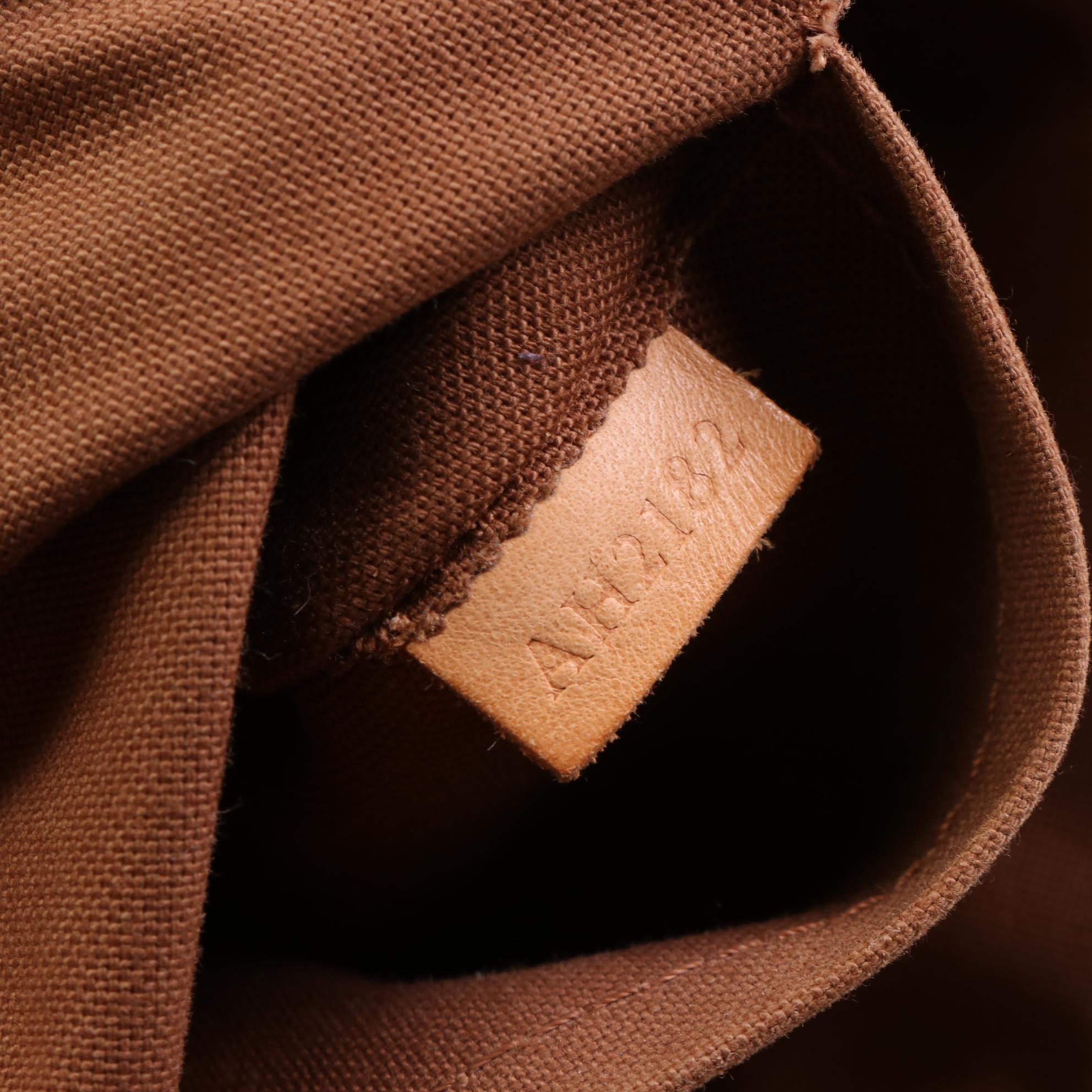 Louis Vuitton Tivoli PM Shoulder Bag in Monogram Canvas and Vachetta Leather