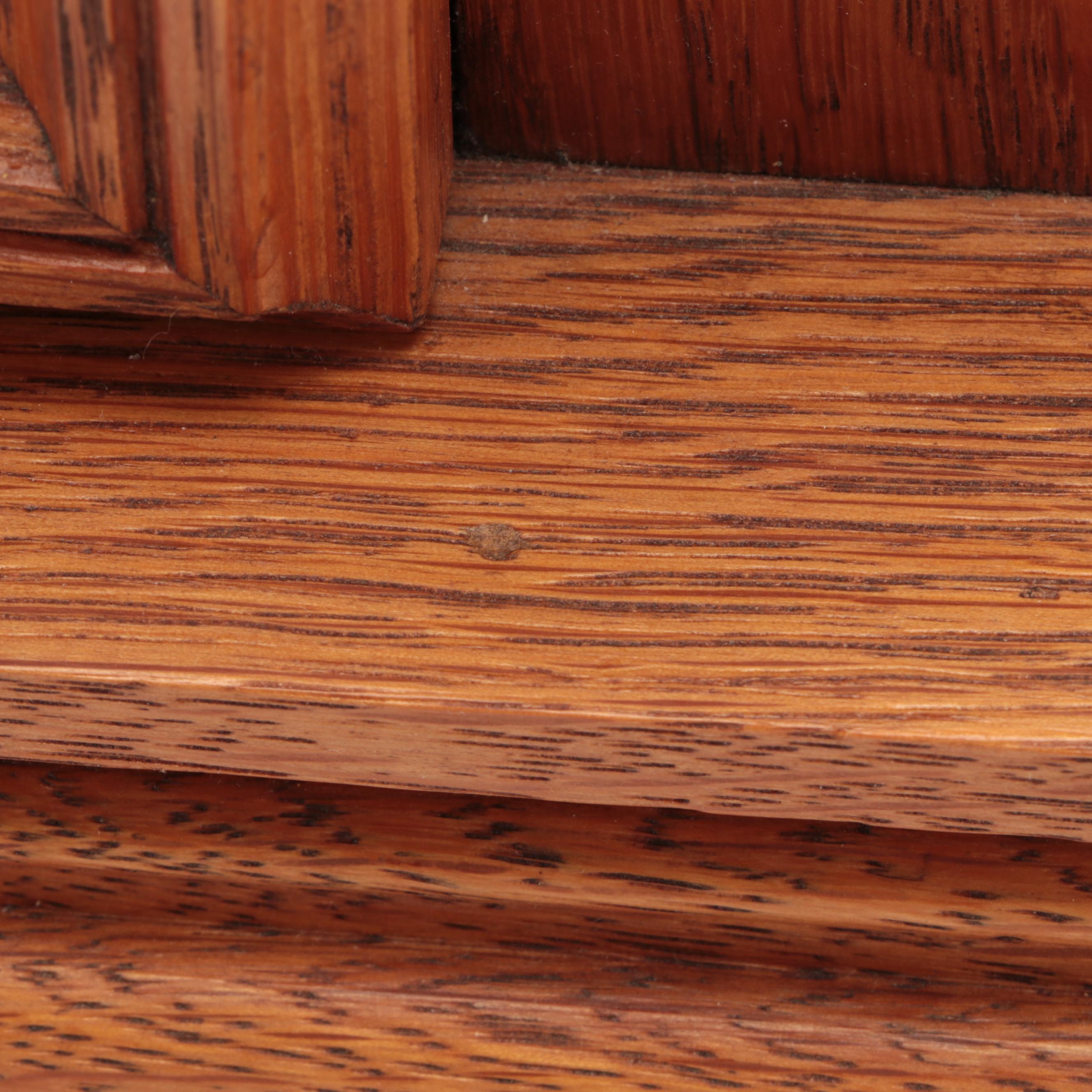 The E. Ingraham & Co. Eastlake Style Oak Wood Mantel Clock