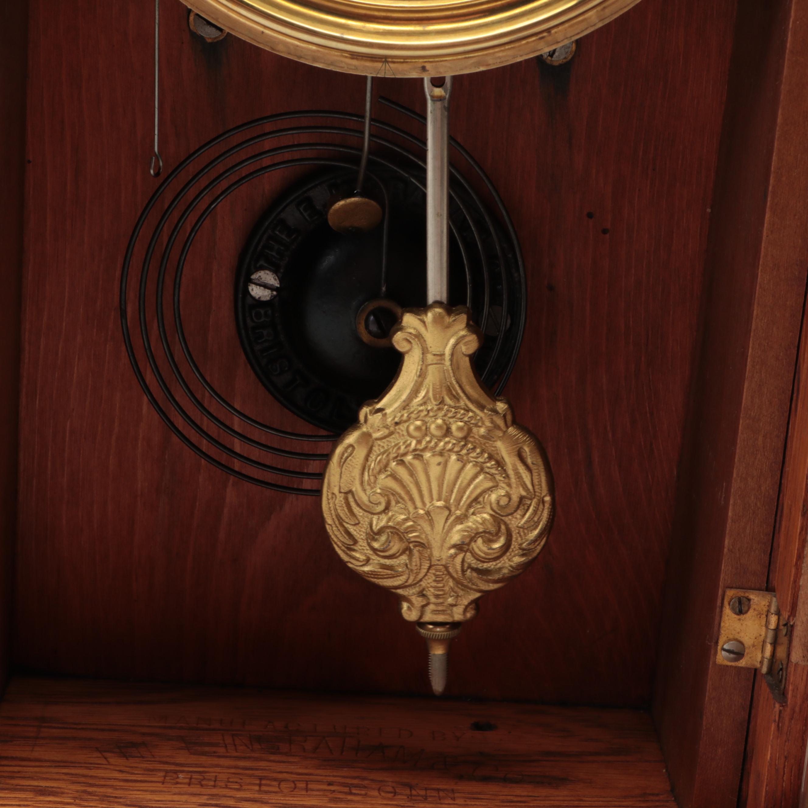 The E. Ingraham & Co. Eastlake Style Oak Wood Mantel Clock