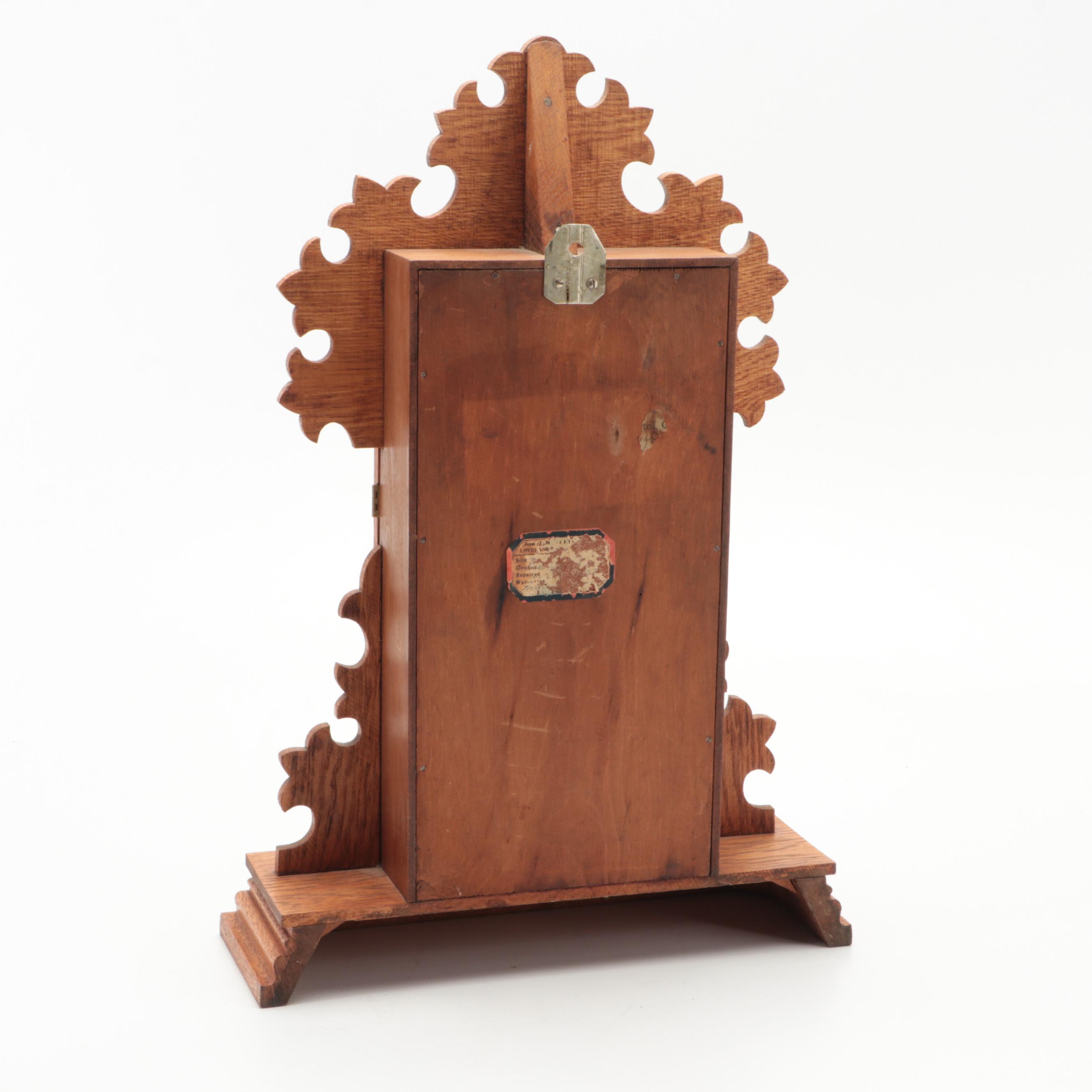 The E. Ingraham & Co. Eastlake Style Oak Wood Mantel Clock