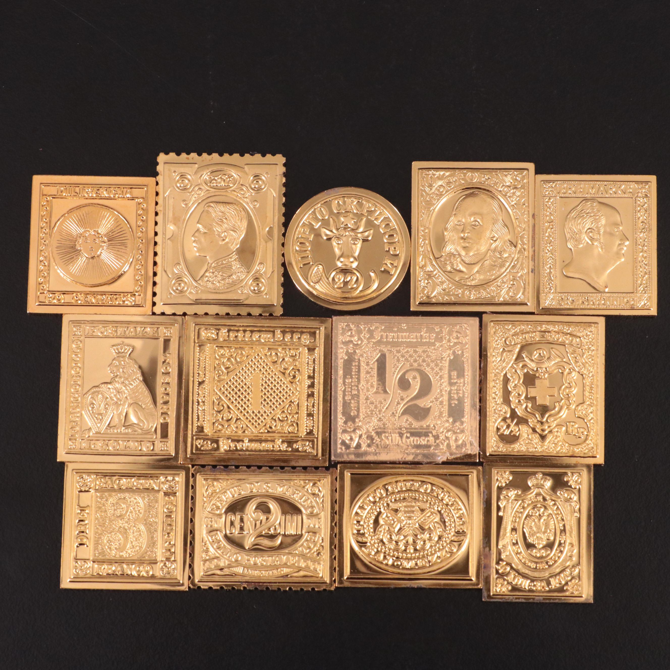 Thirteen Gold-Plated Sterling Silver Postage Stamp Reproductions