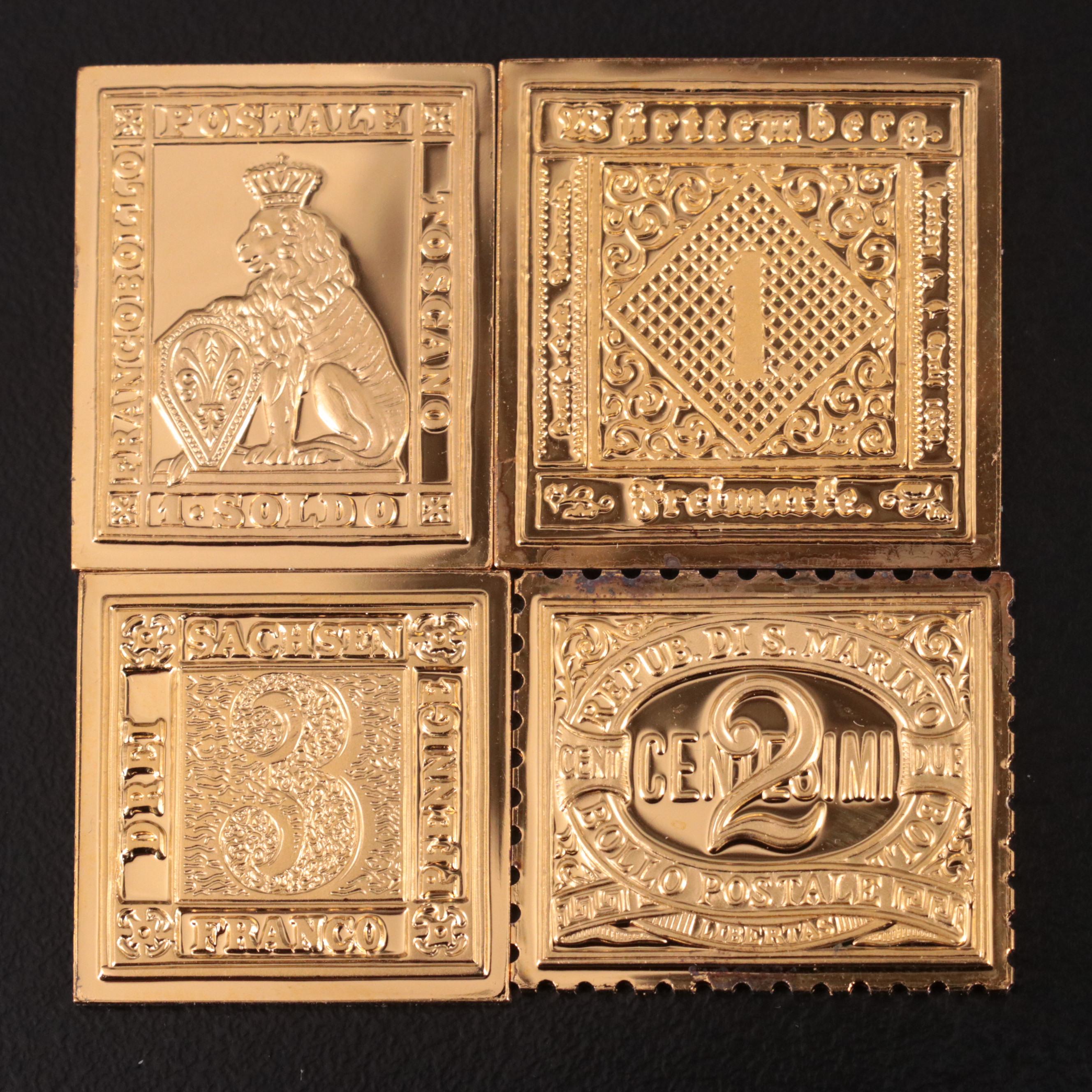 Thirteen Gold-Plated Sterling Silver Postage Stamp Reproductions