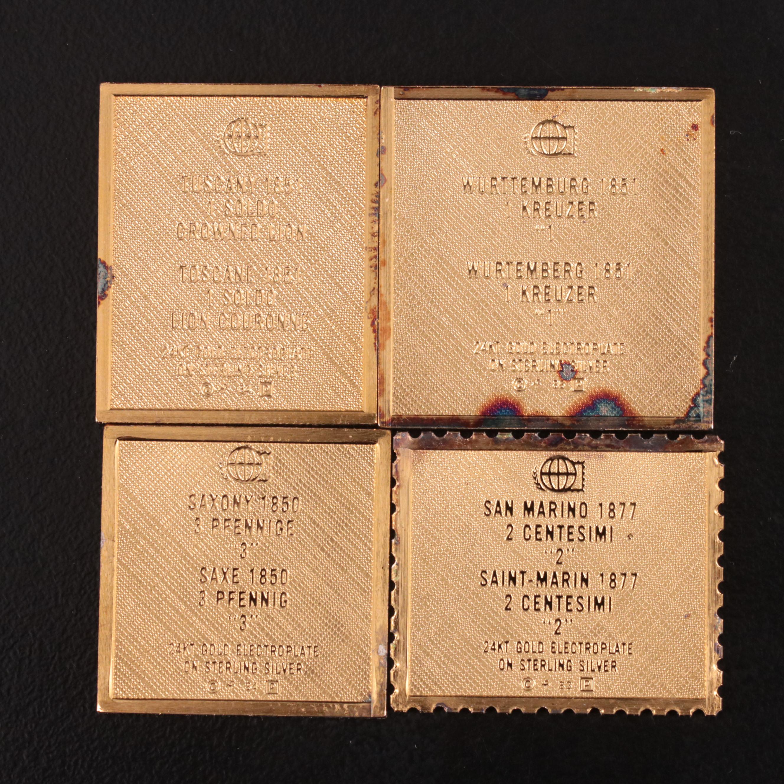 Thirteen Gold-Plated Sterling Silver Postage Stamp Reproductions