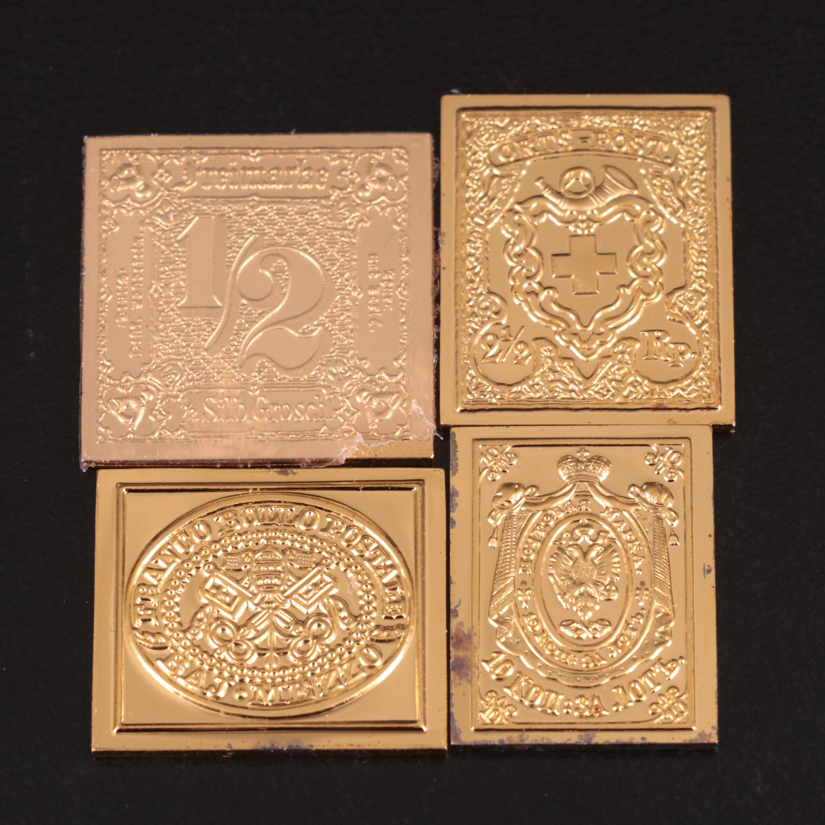 Thirteen Gold-Plated Sterling Silver Postage Stamp Reproductions