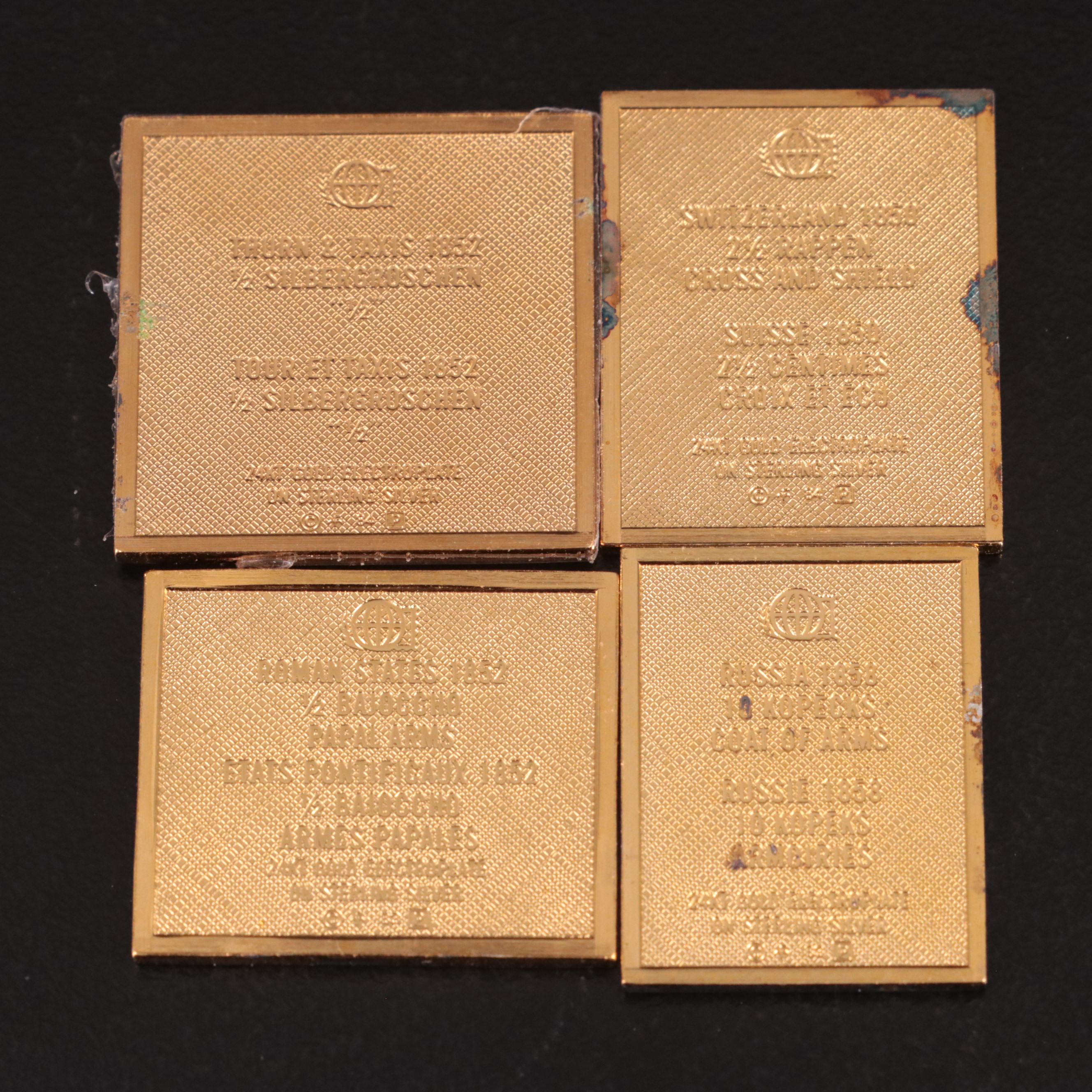 Thirteen Gold-Plated Sterling Silver Postage Stamp Reproductions