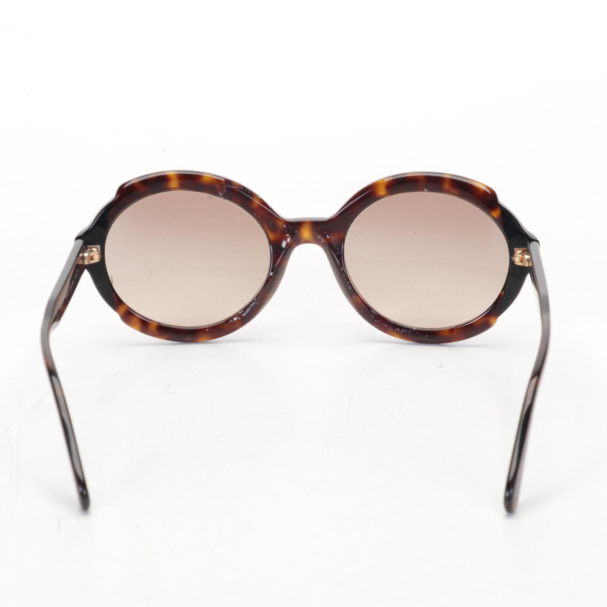 Prada SPR17U Round Sunglasses and VPR19S Prescription Glasses