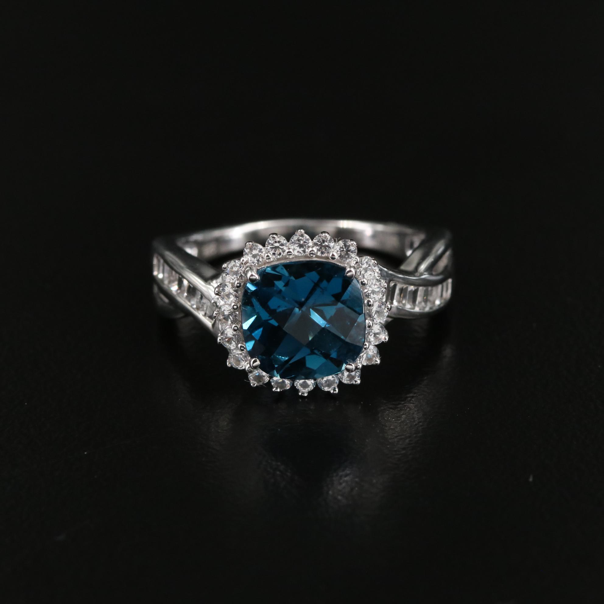 Sterling Blue Topaz and White Sapphire Crossover Ring